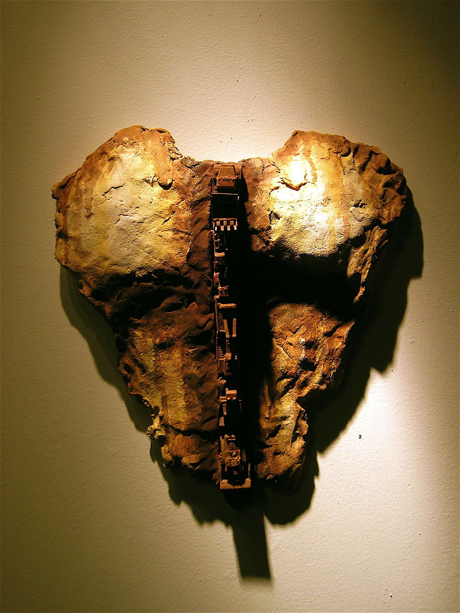 The recollection of fragmented remains, shielded by decay 2003-2007 Ceramic on rusted steel (dimensions vary) When we uncover who we are, it comes in bits and pieces of what we are made of, thus the fragments of skeletal remains hint at what the whole was and can be.