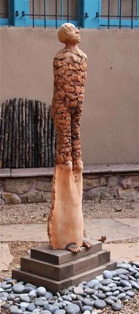 Rooted in an ever ascending spiral 2003 Ceramic and wood 69 x 16 x 26 Locked into the strengths of the earth and family, we ascend into an ever increasing view of the grandeur of the fullness of living.