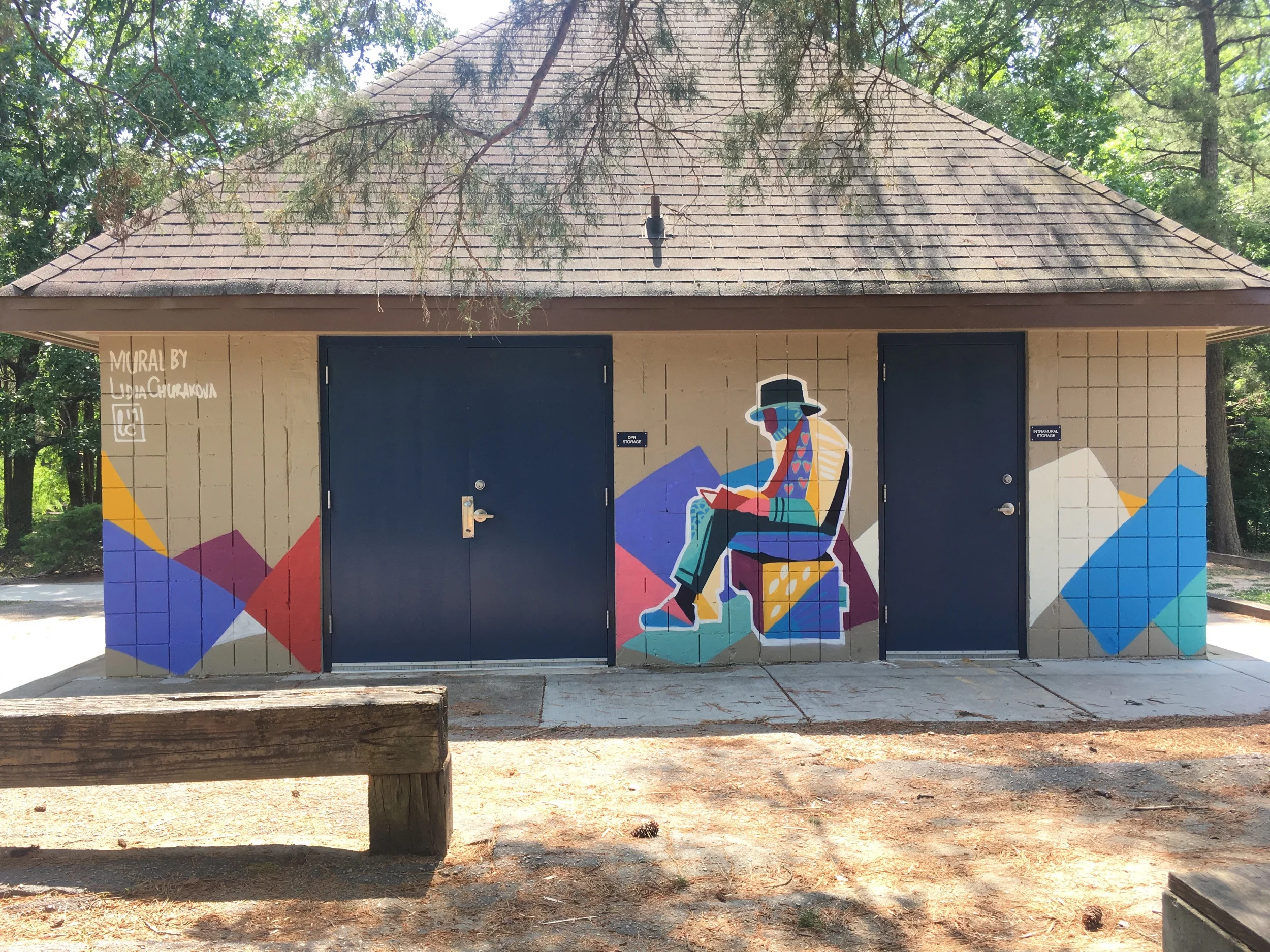 East wall mural facing outdoor seating area.