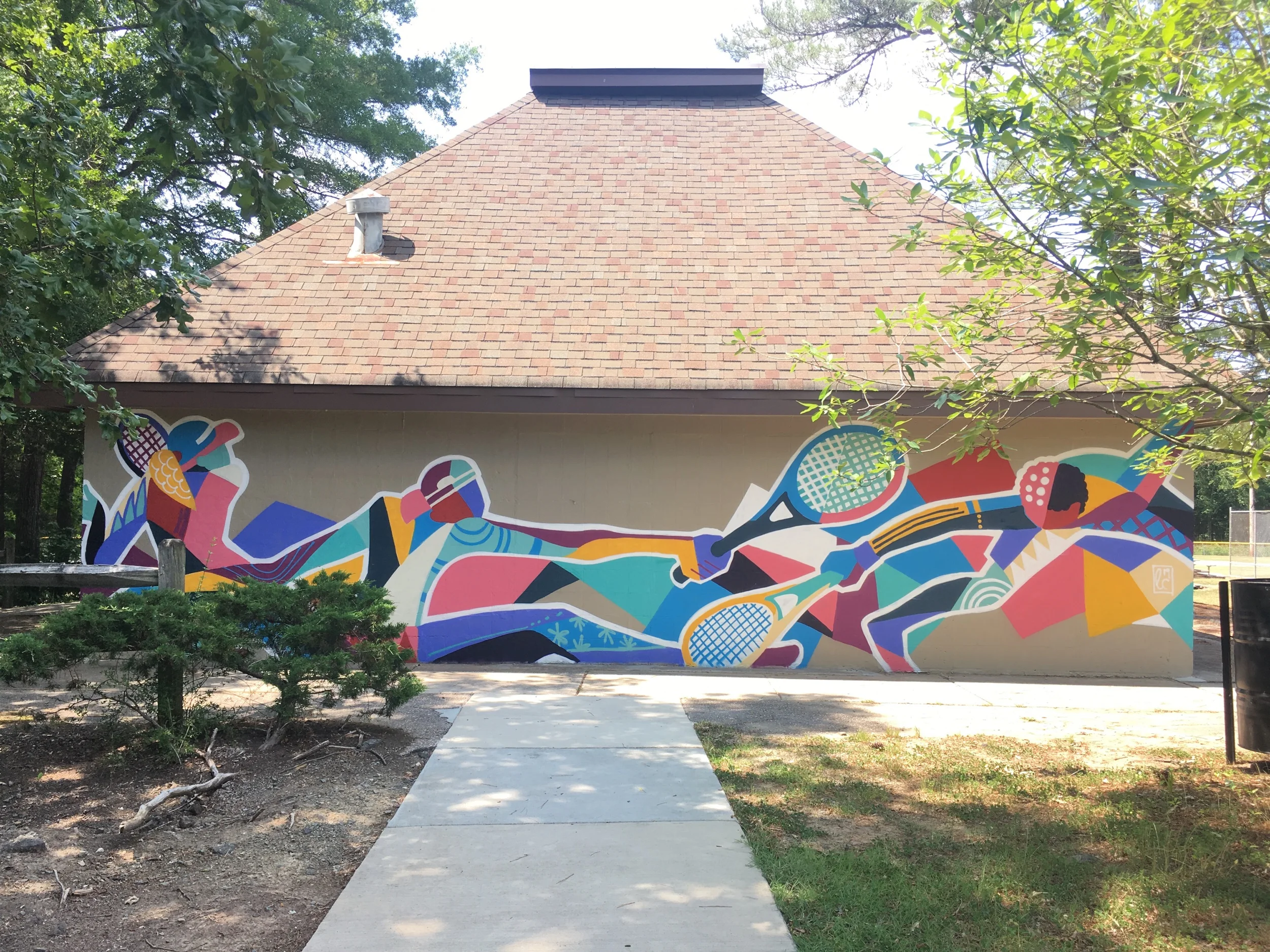 South wall mural facing the tennis courts.