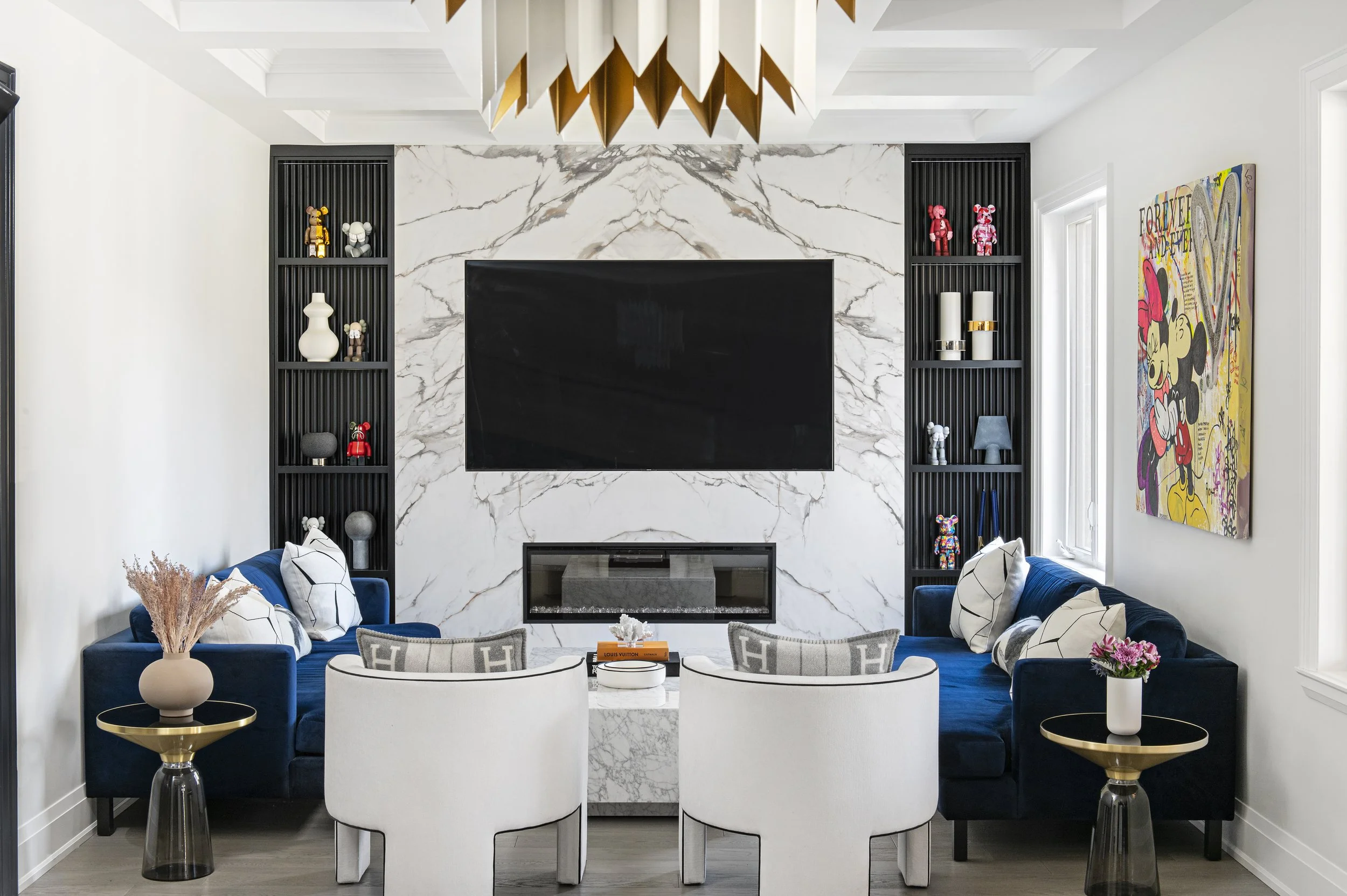 Family room, stone fireplace, linear fireplace bold art and custom sofas