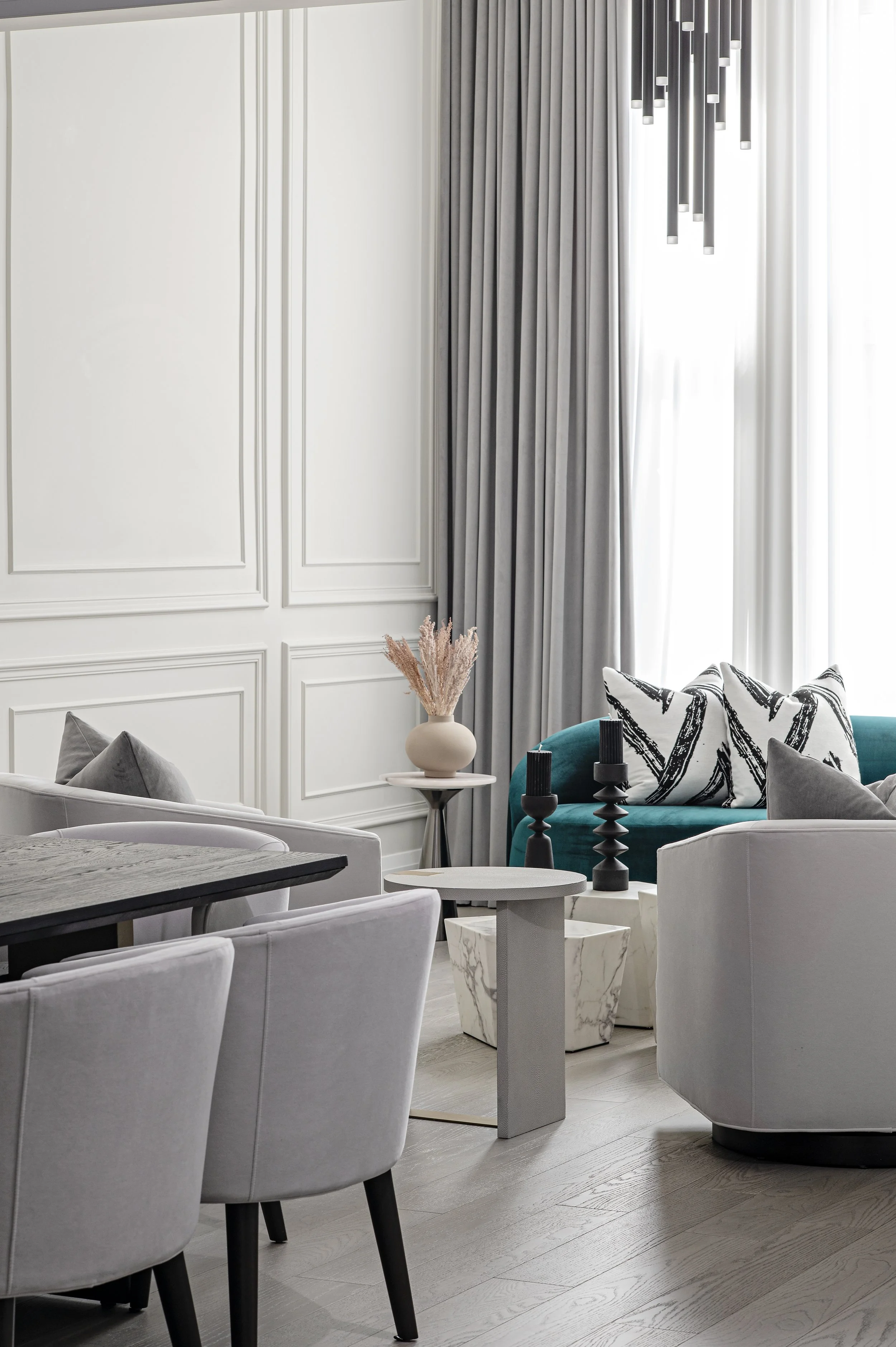 Wall panel, custom curved sofa, drapery, velvet, black and white, bold colours, livable luxury