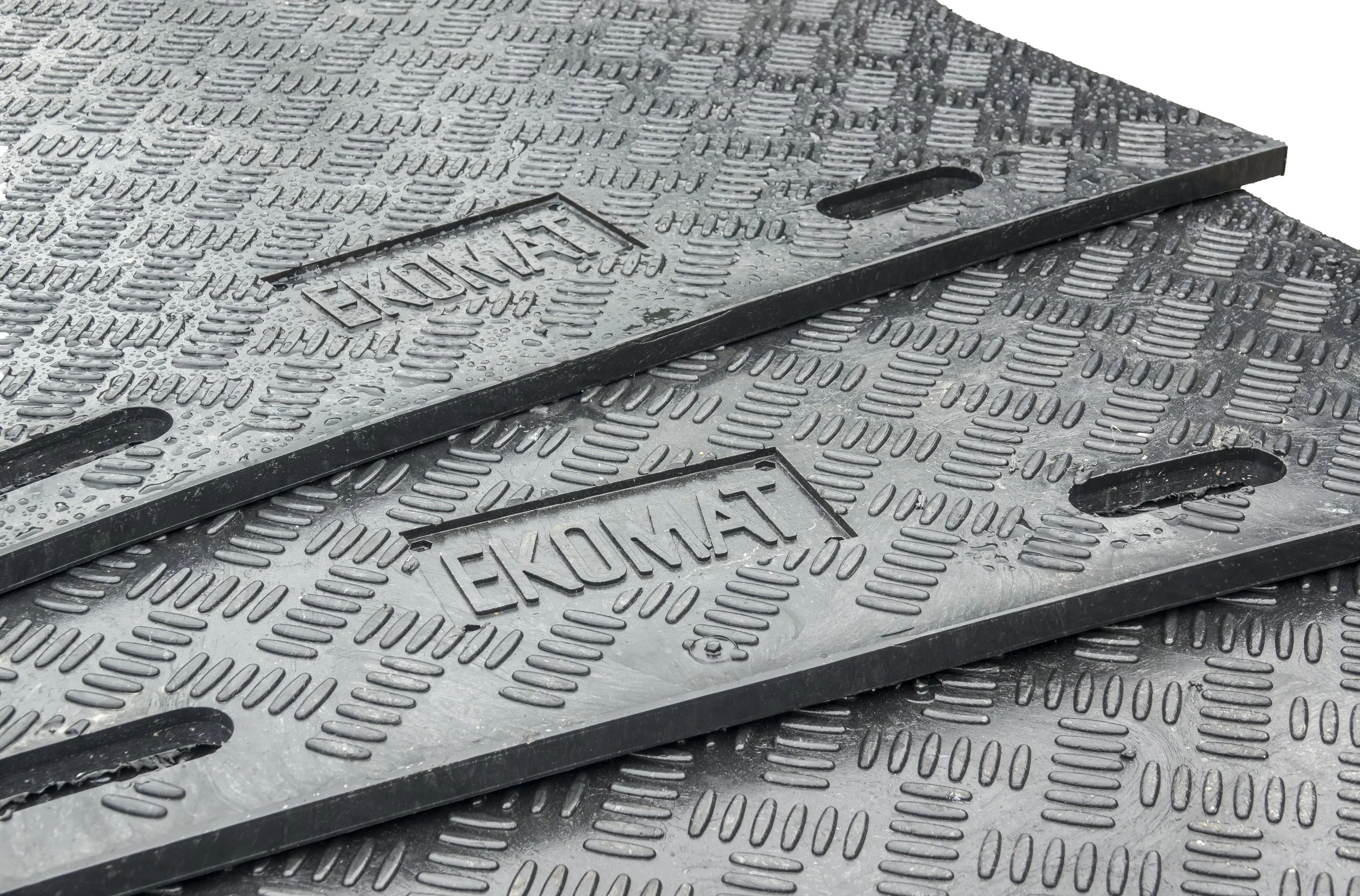 Sustainable ground protection mats made from recycled plastics