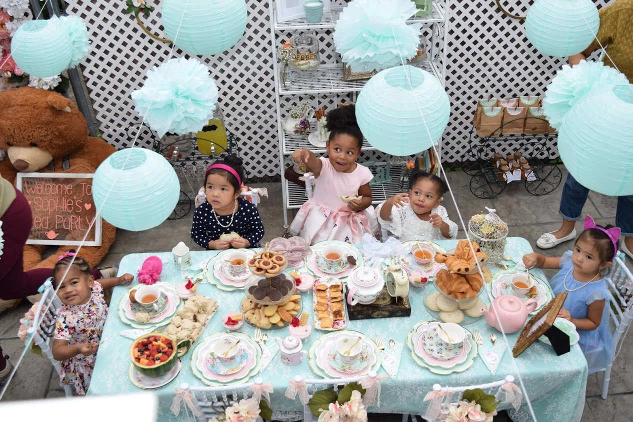  They loved their overhead flower balls and lanterns which created the perfect oasis for these little ladies to enjoy their tea 