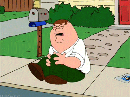 A GIF of Peter Griffin clutching at his knee in pain as he rocks back and forth on the sidewalk.