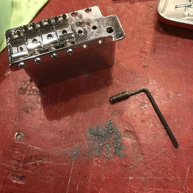 Broken trem arm in a Stratocaster block - Drilled a pilot hole into the broken end of the trem arm & then hammered in an Alan Key ,, The broken piece then came out without any damage to the block @josephkayeguitars #fender #stratocaster #repair #