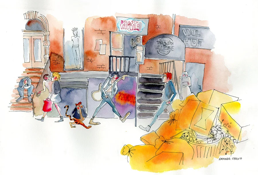 Puss and the Guitarist Walking in the East Village