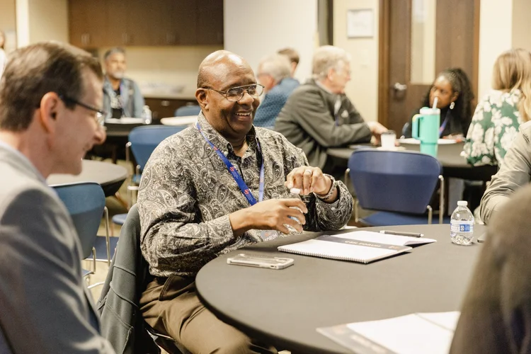 Church leader learning at a table