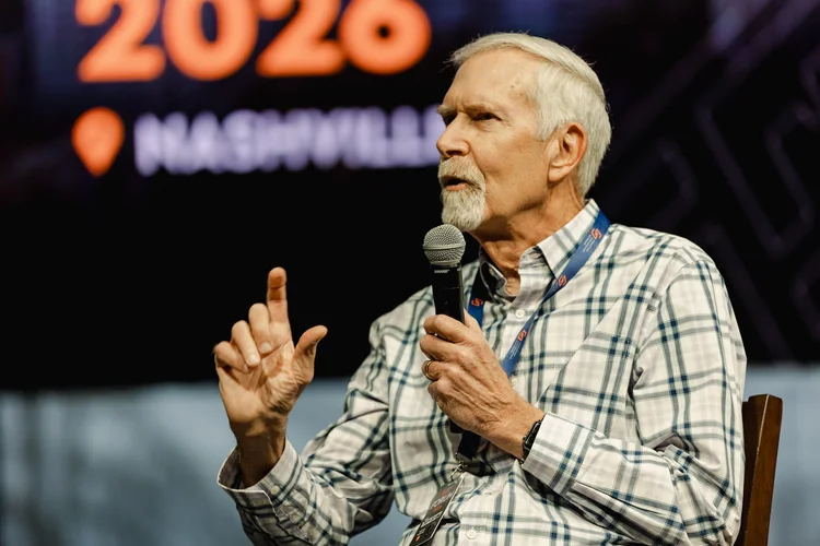 Church leader preaching at a CSN event