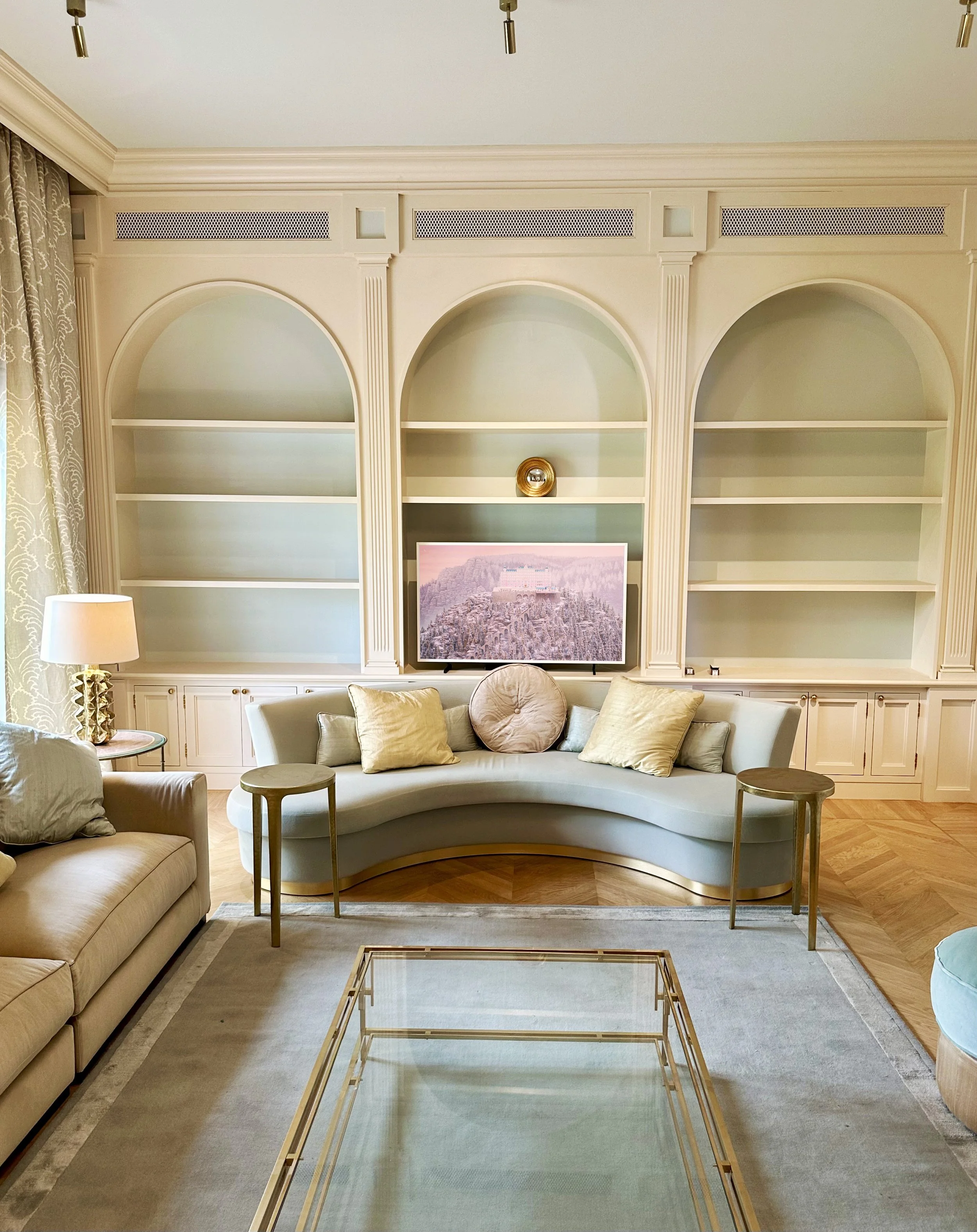 custom-classical-wall-unit-arched-shelving-mediterranean-interior.jpg