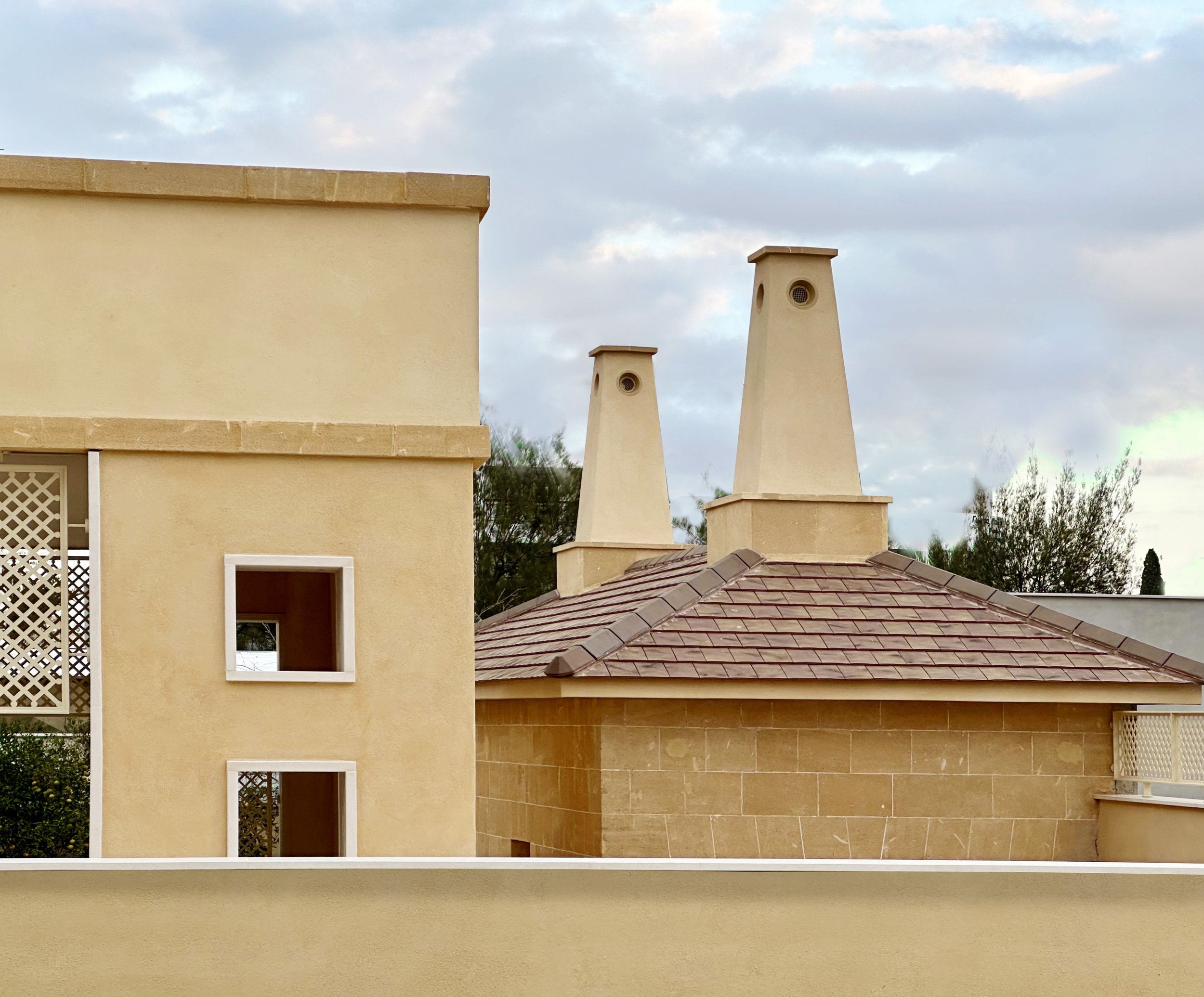 mediterranean-style-villa-roof-design-classical-chimneys.jpg