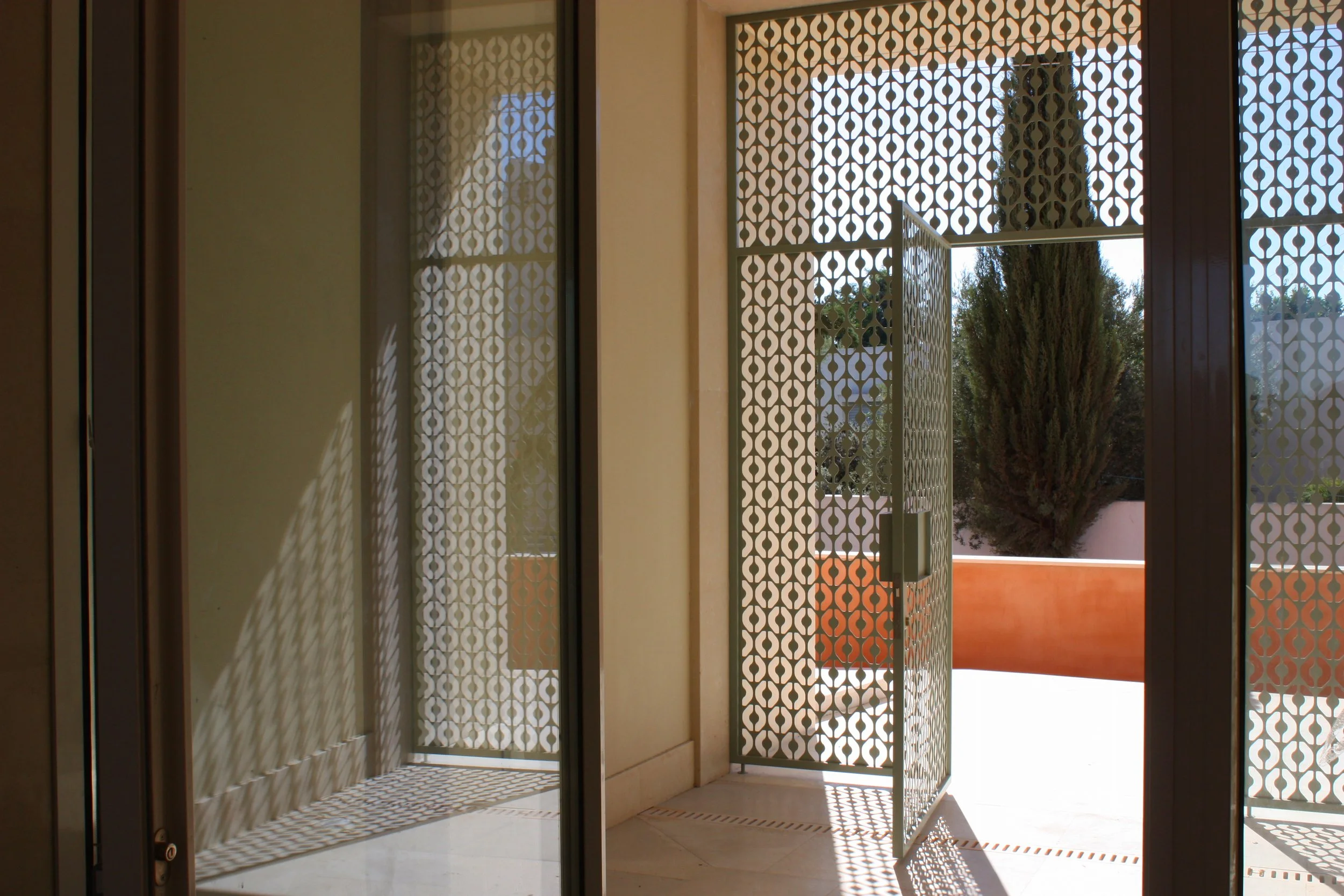 country-villa-nicosia-patterned-metal-door-detail10.jpg
