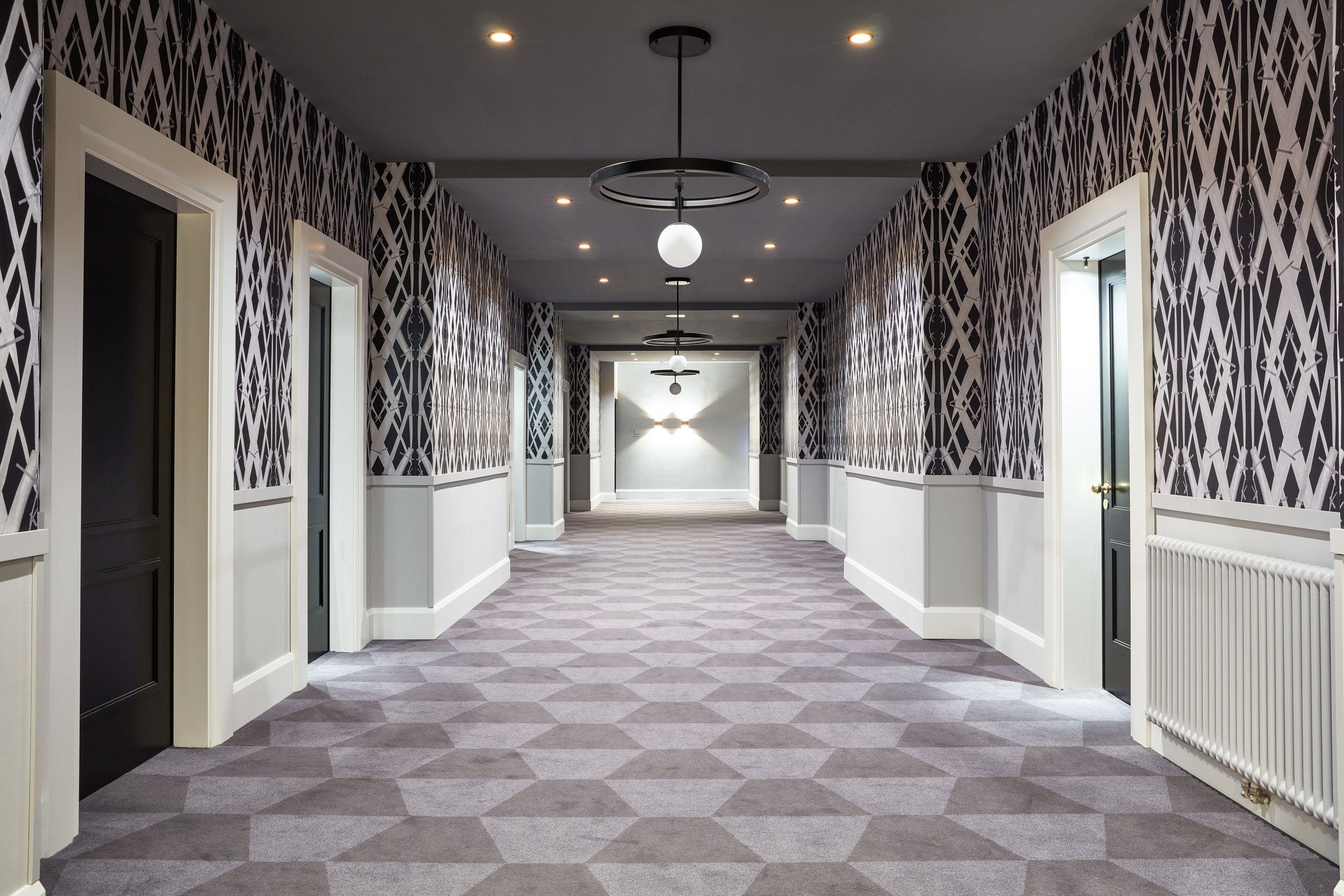 Hotel corridor with Meadow Grass Black wallpaper