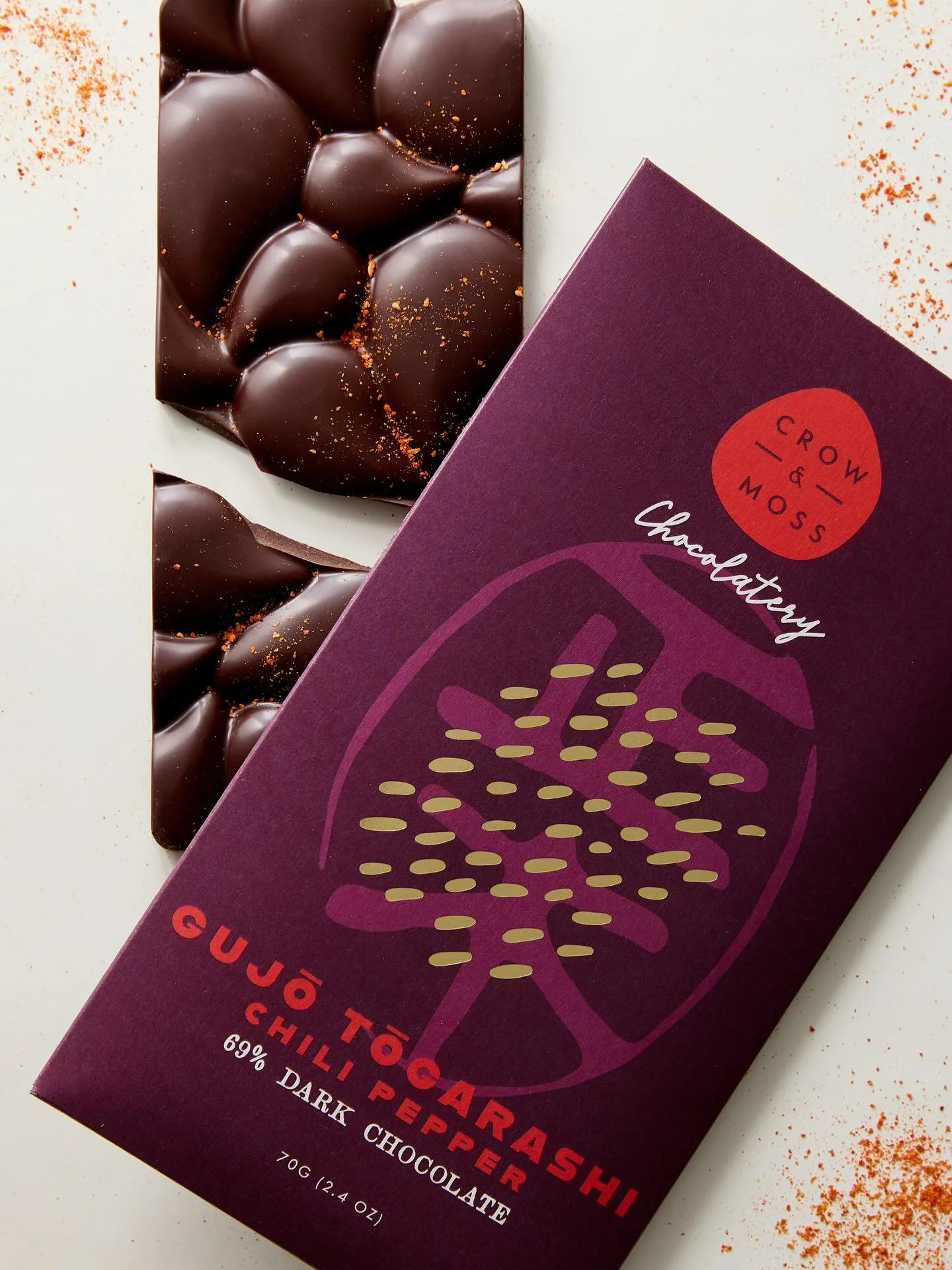 Eva Masaki collaborates with Michigan-based chocolatier Crow &amp; Moss to create Gujō Tōgarashi Chocolate, blending 69% single-origin Wampusirpi cacao from Honduras with chili peppers grown on Shibano Farm in Gujō, Japan near Eva's former alpine vil