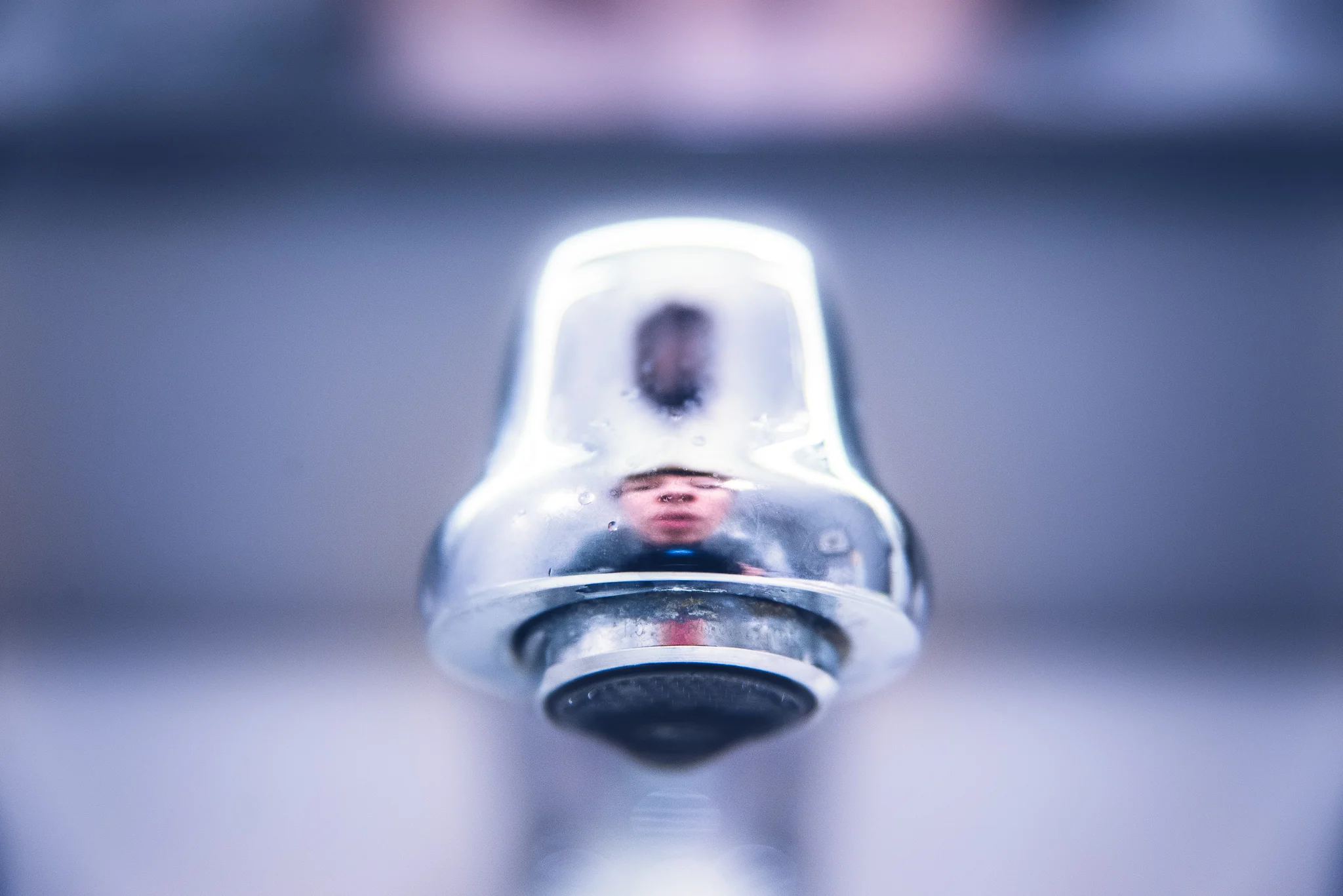 self portrait in faucet