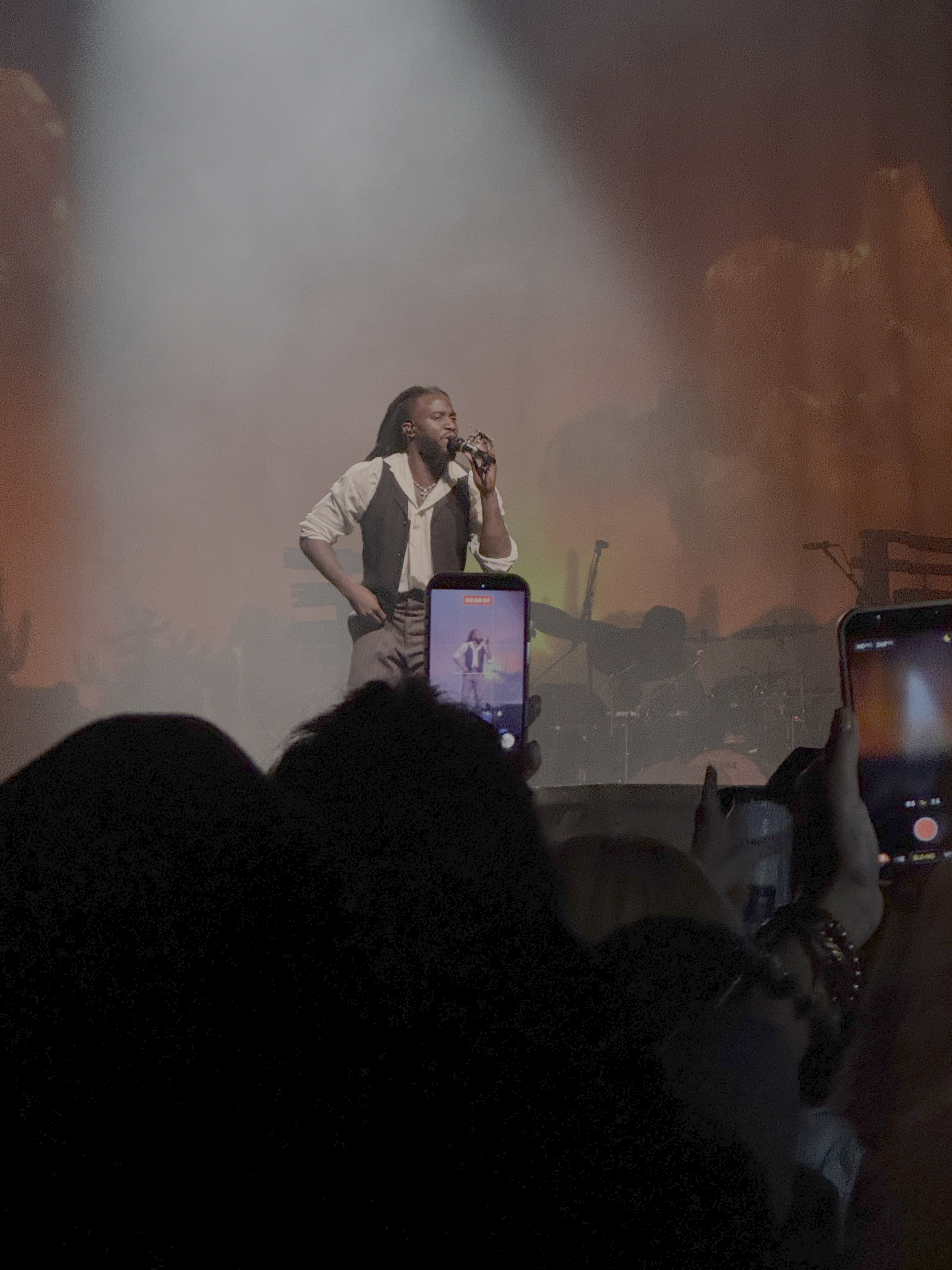 Shaboozey performing onstage during his Outlaws Never Die Tour stop at MGM Music Hall at Fenway in Boston.