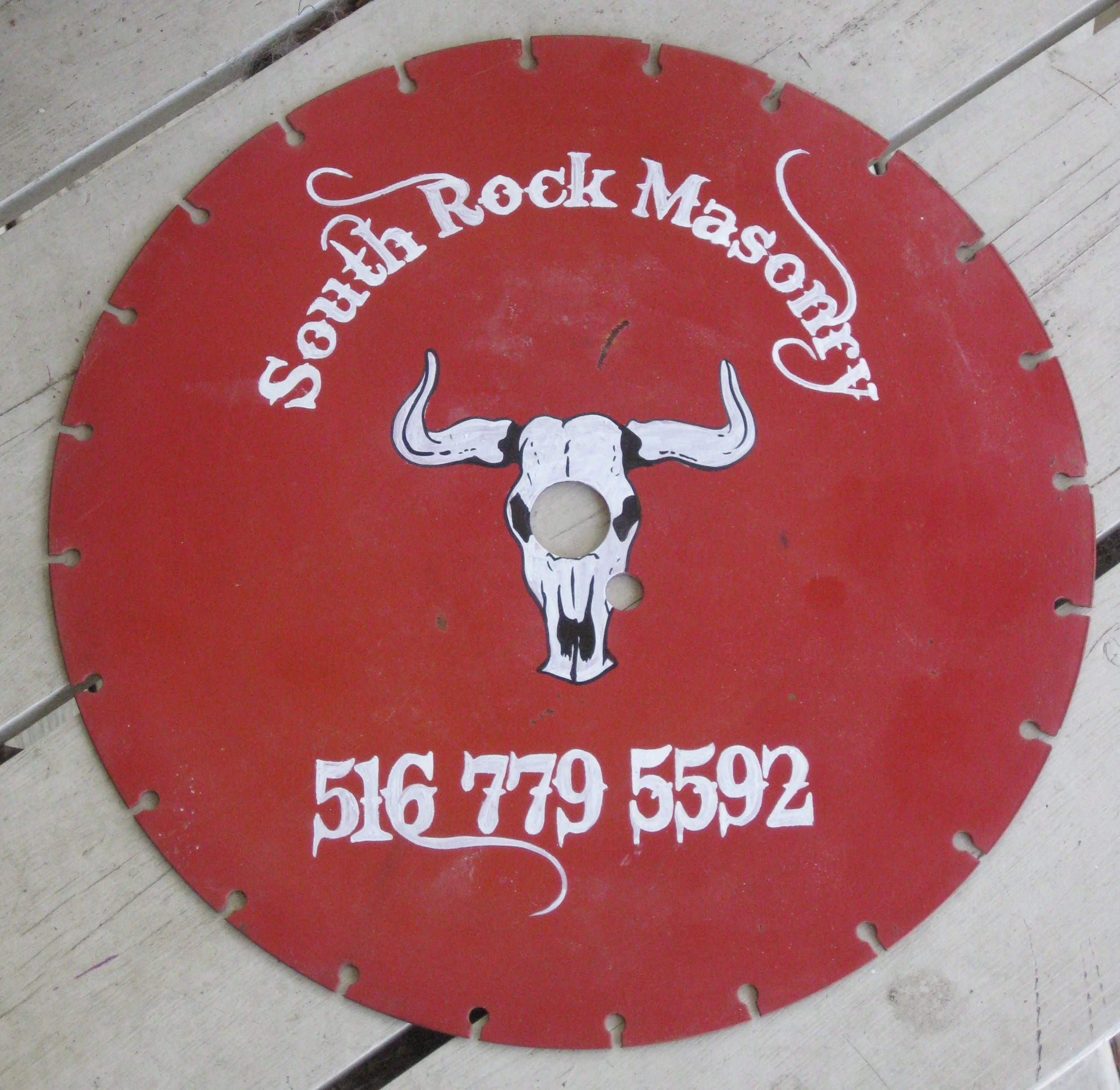  Saw blade for display in the office of a masonry company 