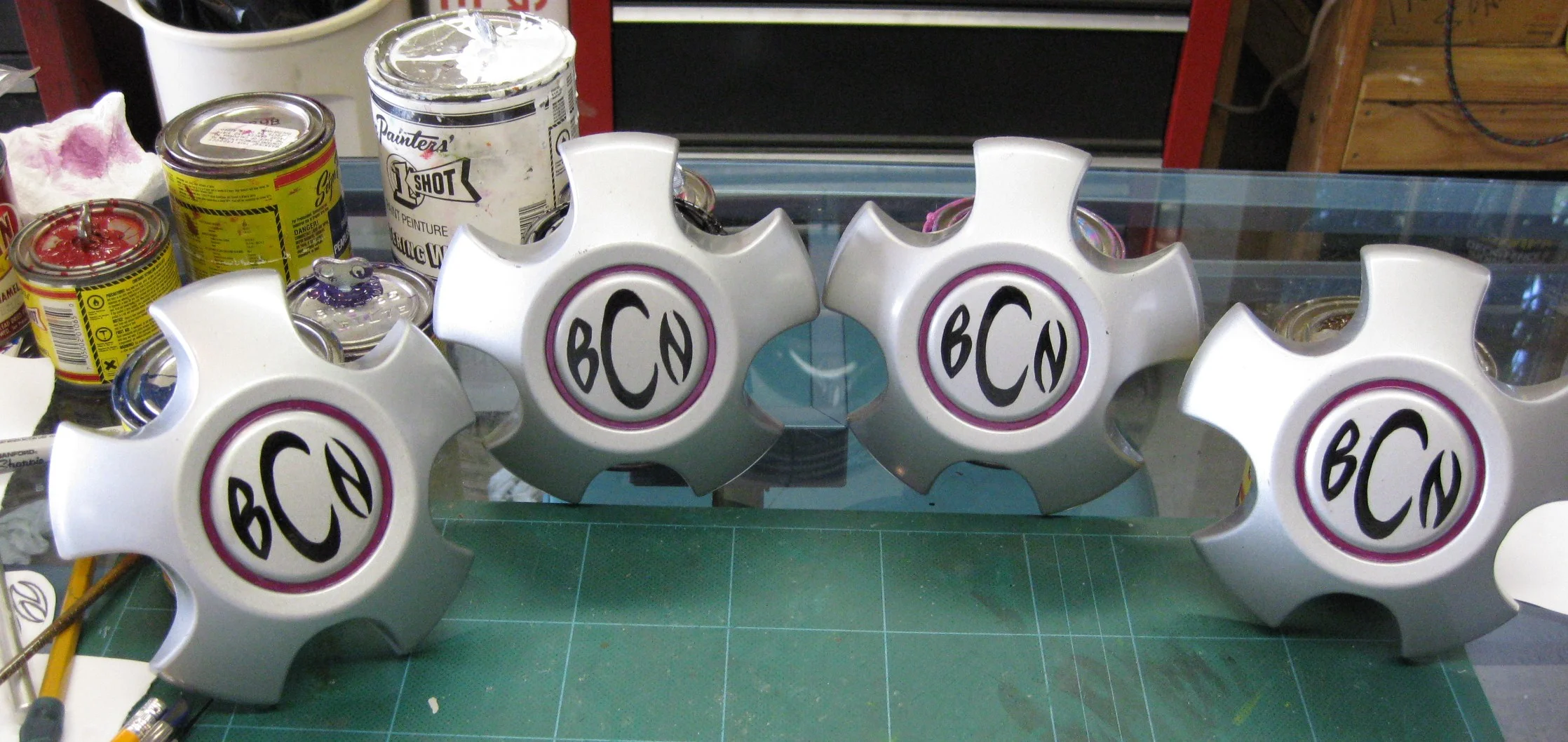  Center caps personalized with owner’s initials 