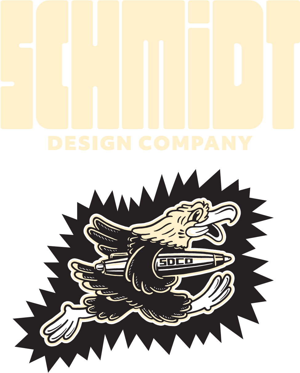 Logo for Schmidt Design Company featuring a stylized eagle holding a pen in its talons, with a dynamic starburst background.
