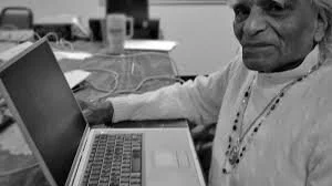 Guruji with Laptop.jpeg