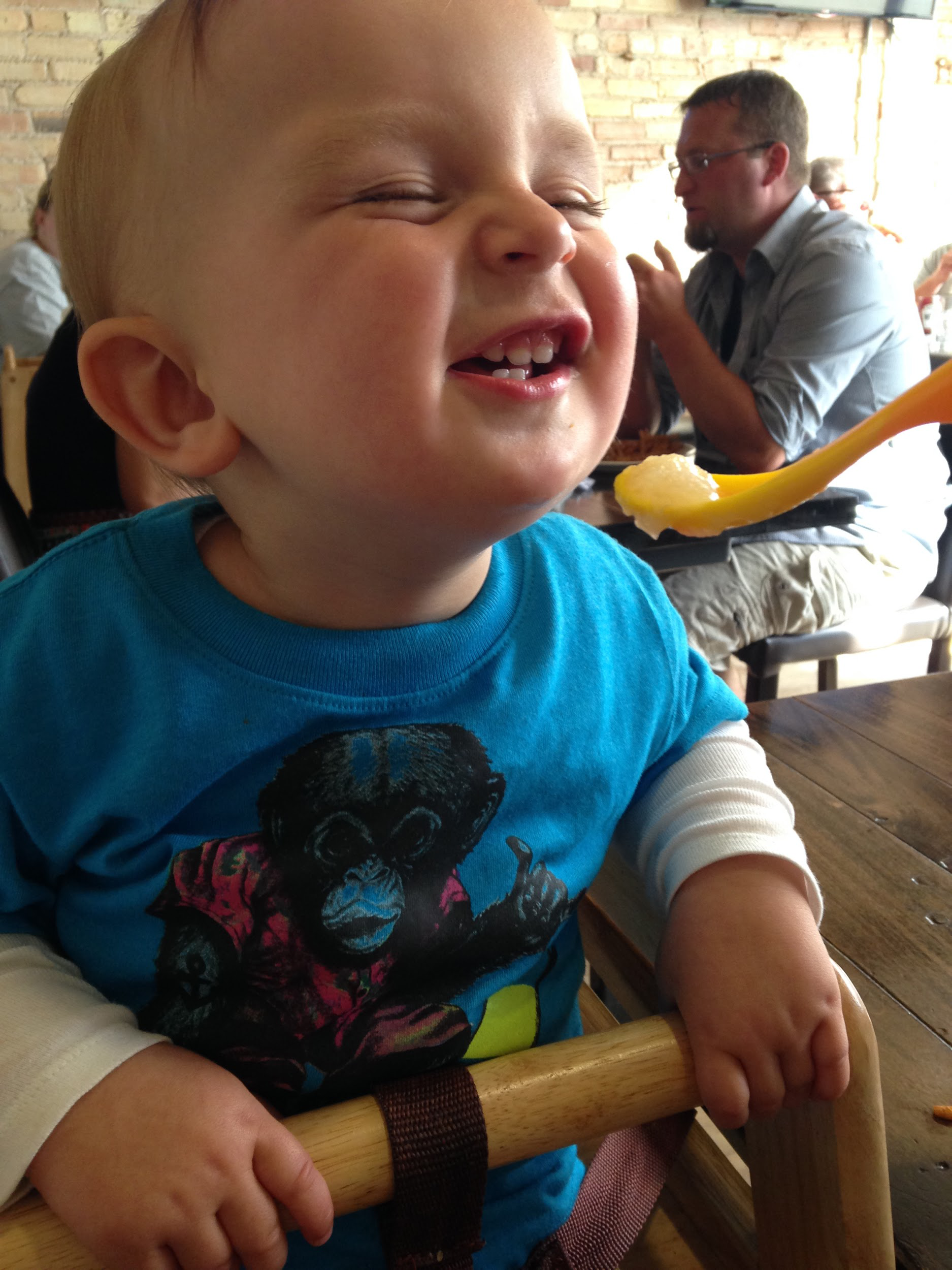 Harvey enjoying some applesauce at when he was 1.5 years old and pictures of the kids’ plates