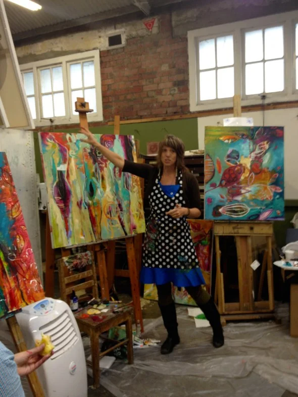 "Flora sharing her thinking process as she paints"