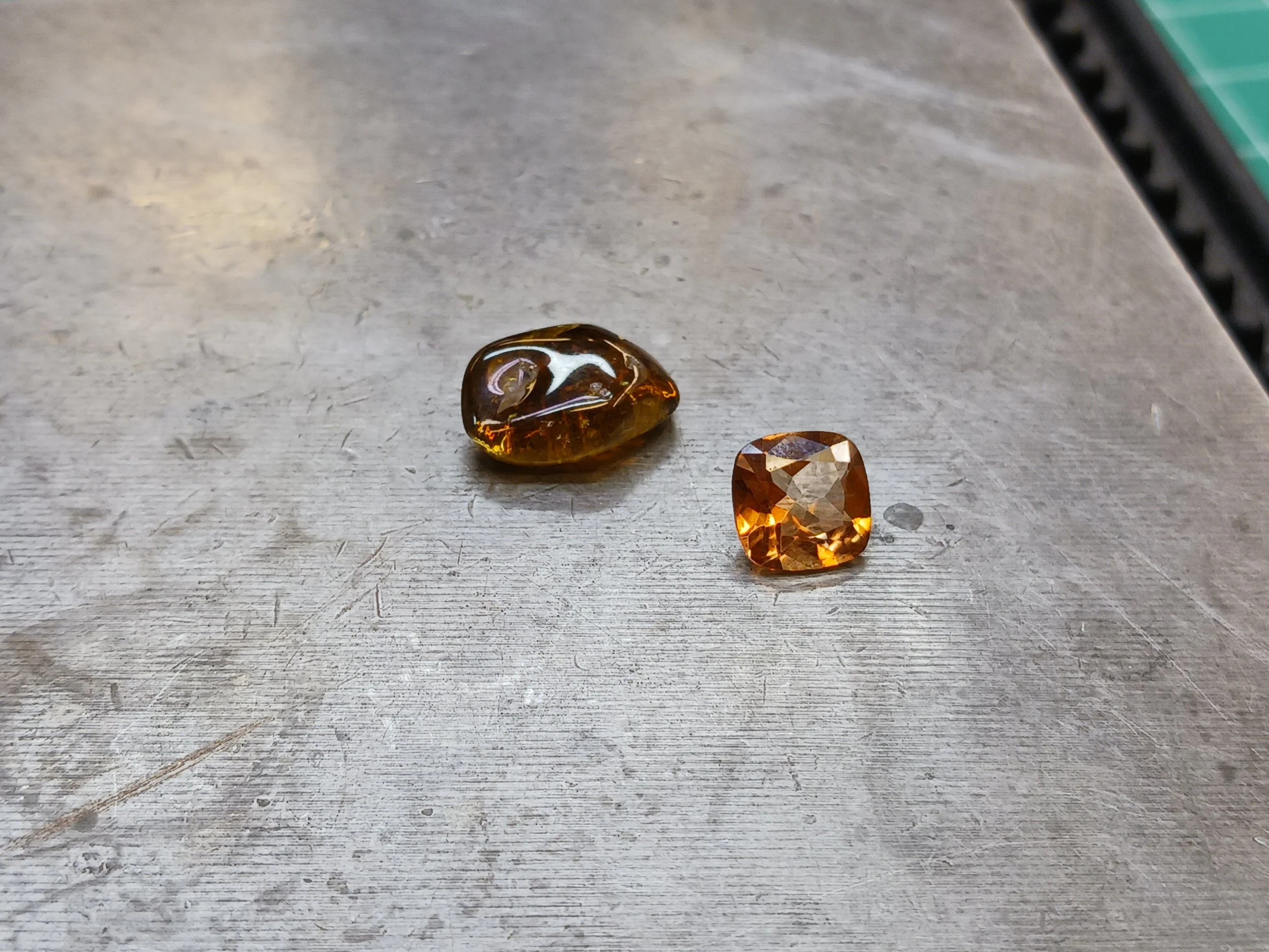 Loose faceted and raw tourmaline stones prepared for a jewelry making class in Albuquerque