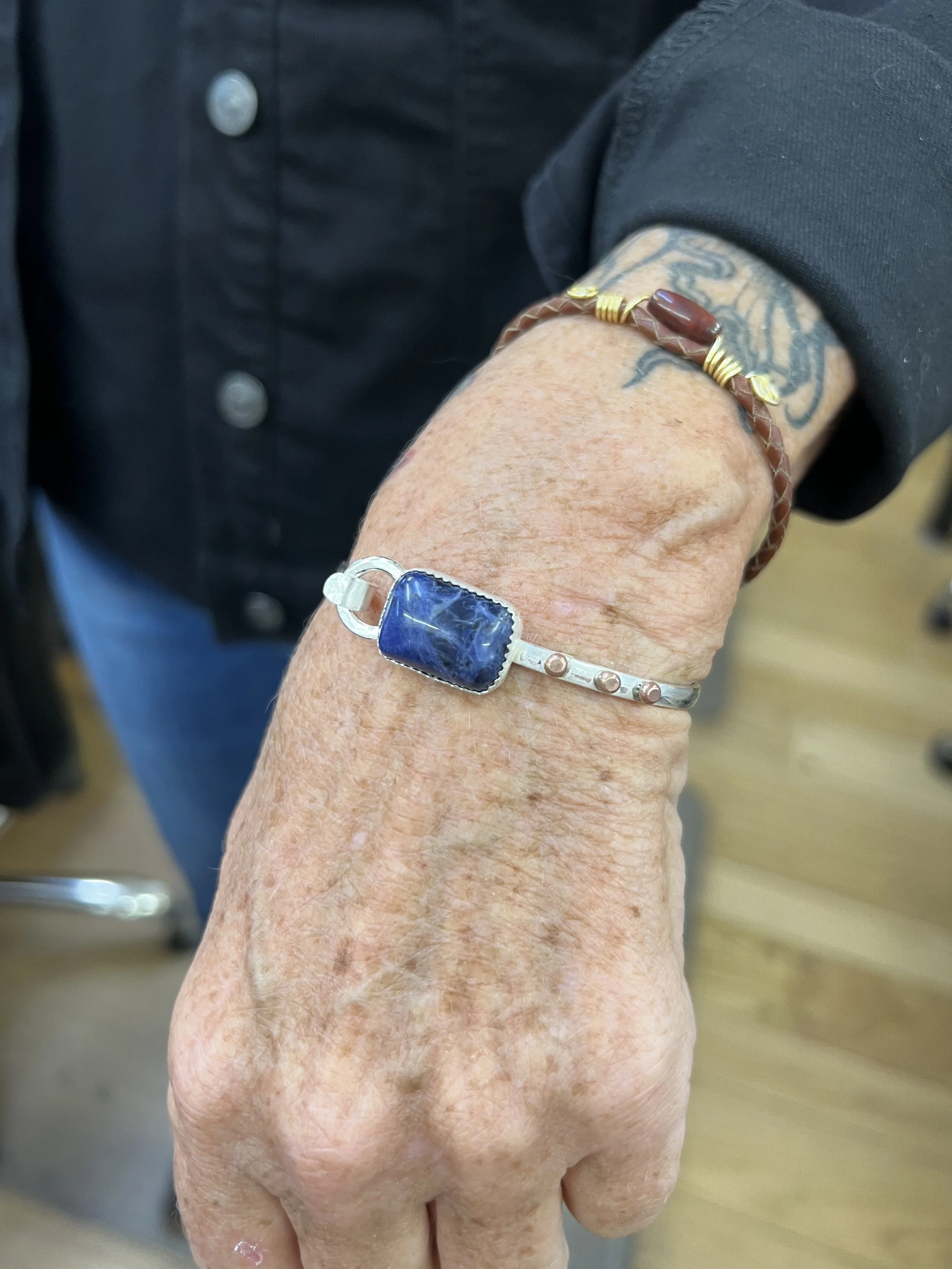 Student-made Infinity Latch Bangle jewelry making class in Albuquerque