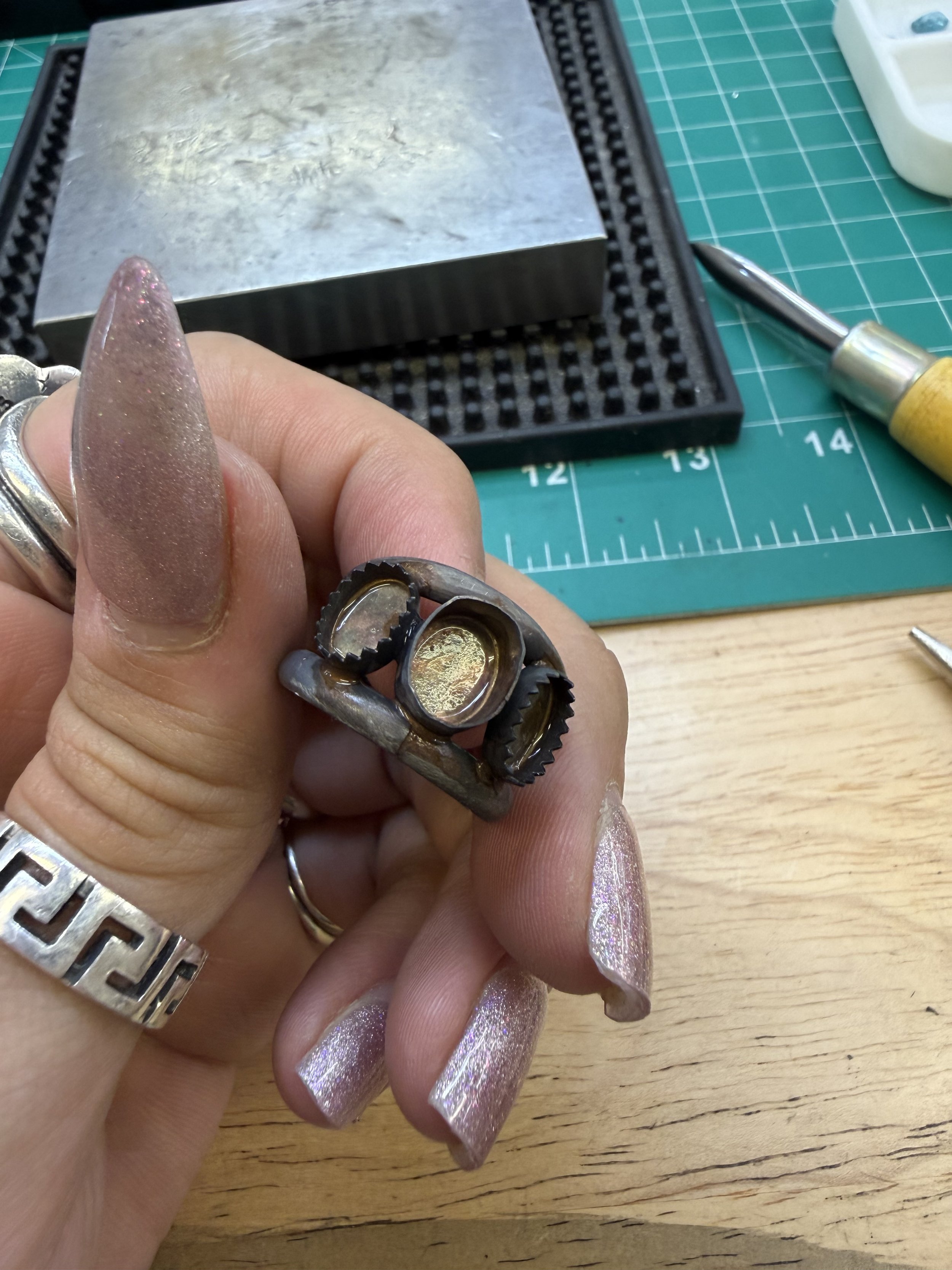 Student shaping a ring in a jewelry making class in Albuquerque