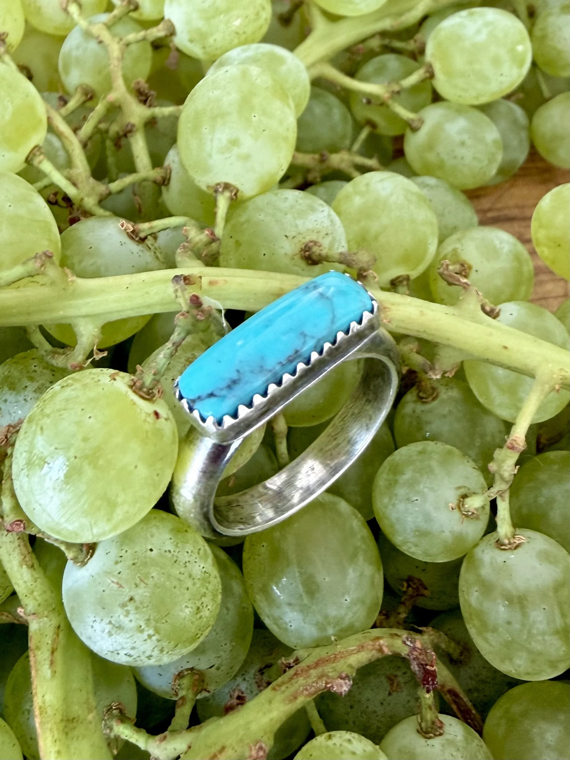 turquoise ring in Albuquerque finished piece in natural light