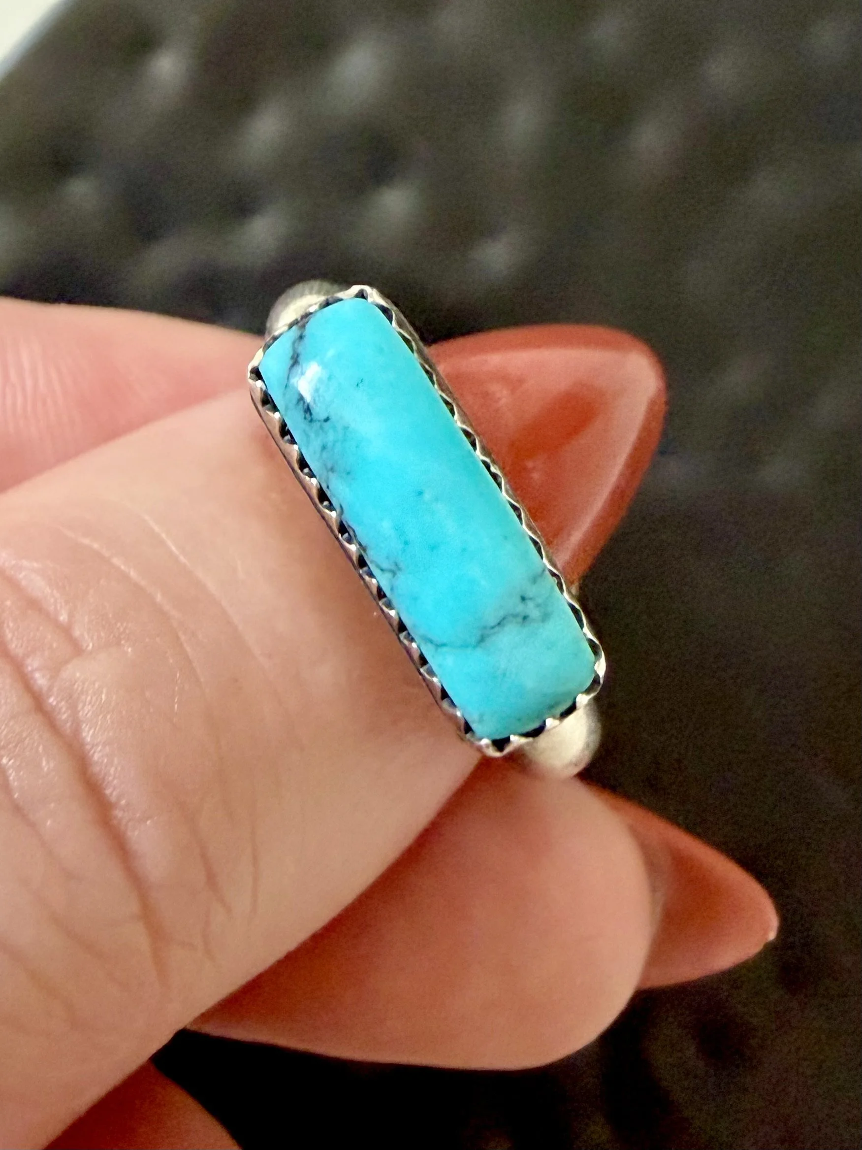 turquoise ring in Albuquerque close up polished stone and silver
