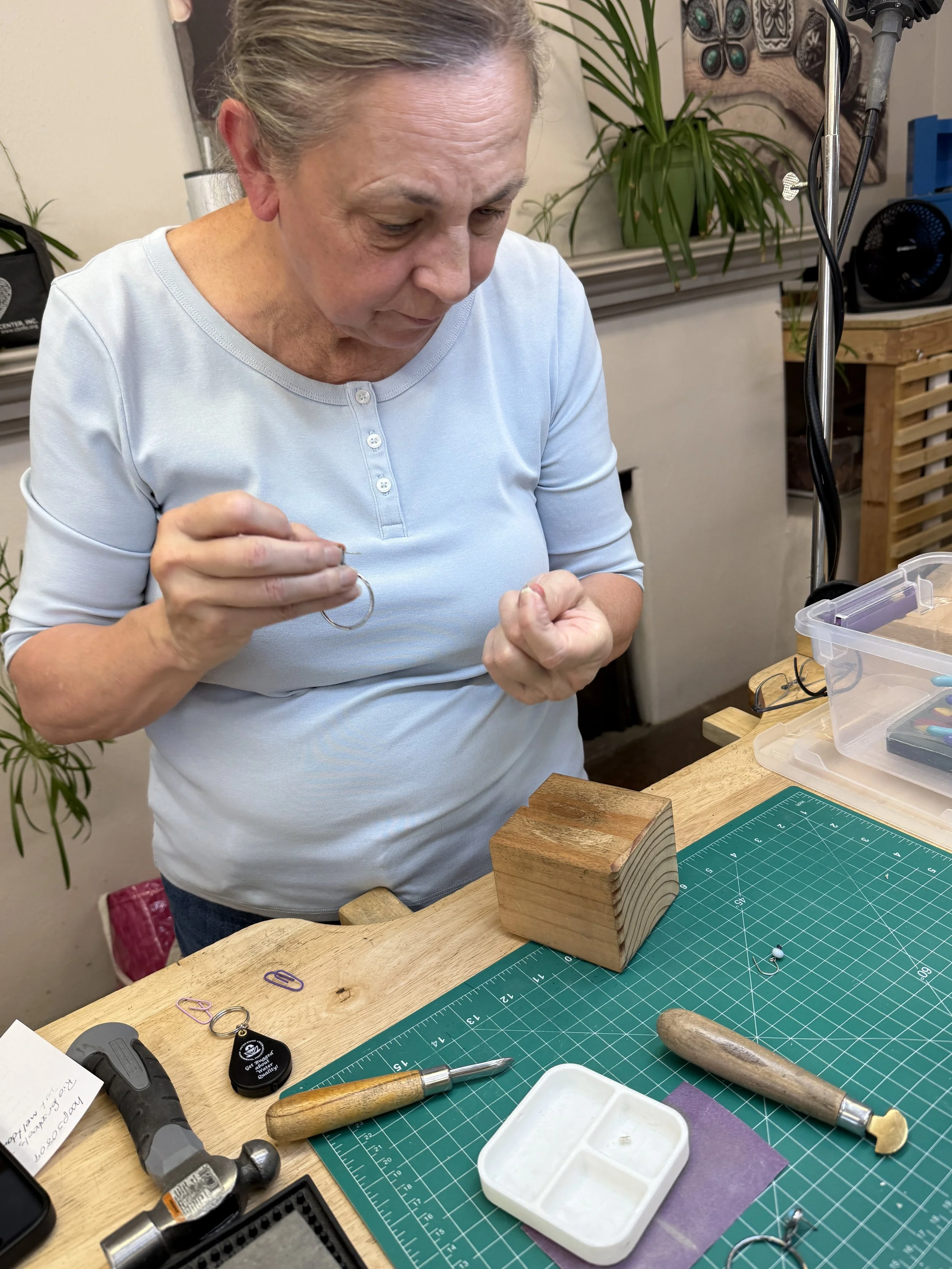 Turquoise stones set into hoops in a Jewelry Making Class in Albuquerque