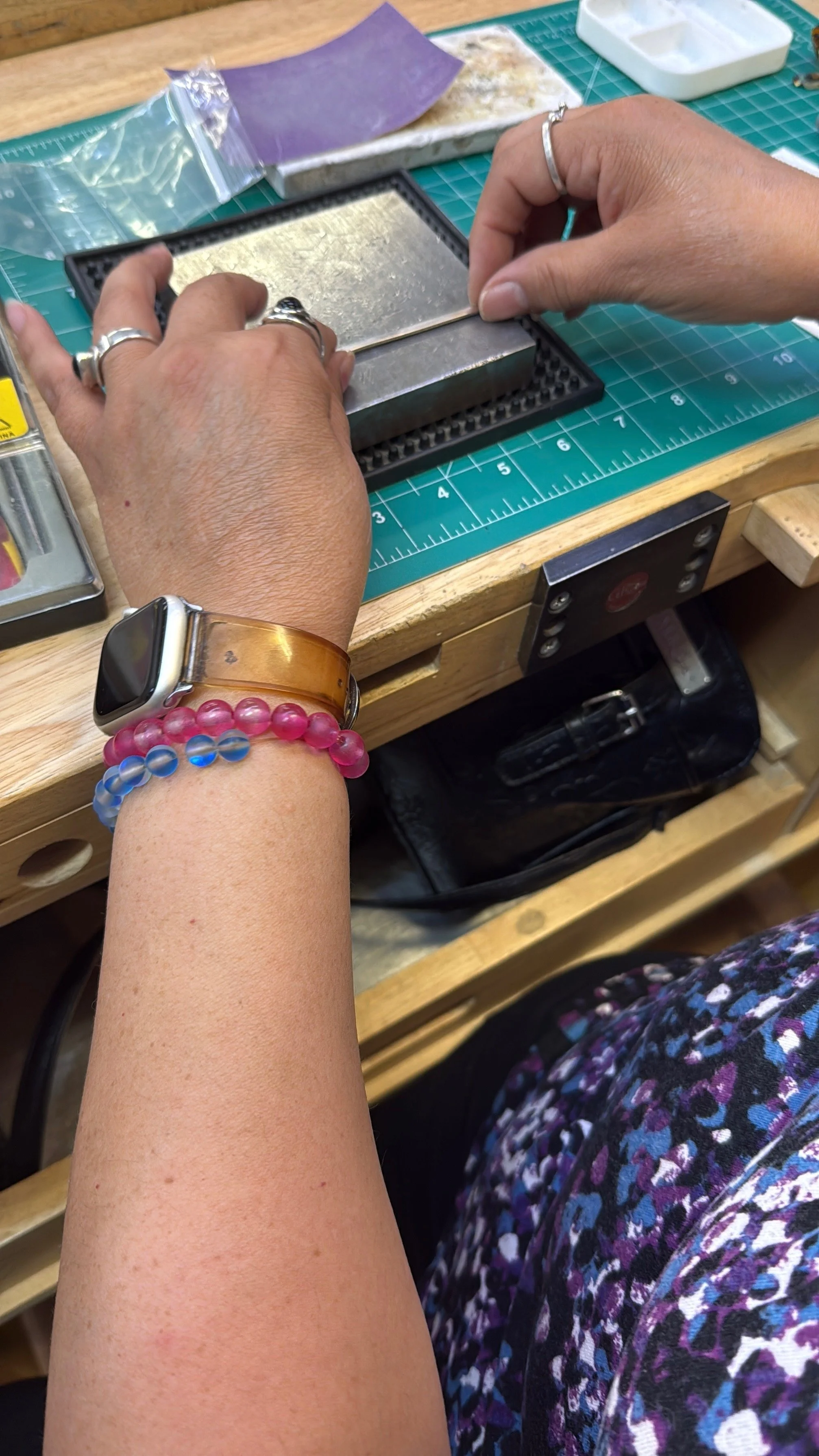 Student texturing silver in a Jewelry Making Class in Albuquerque