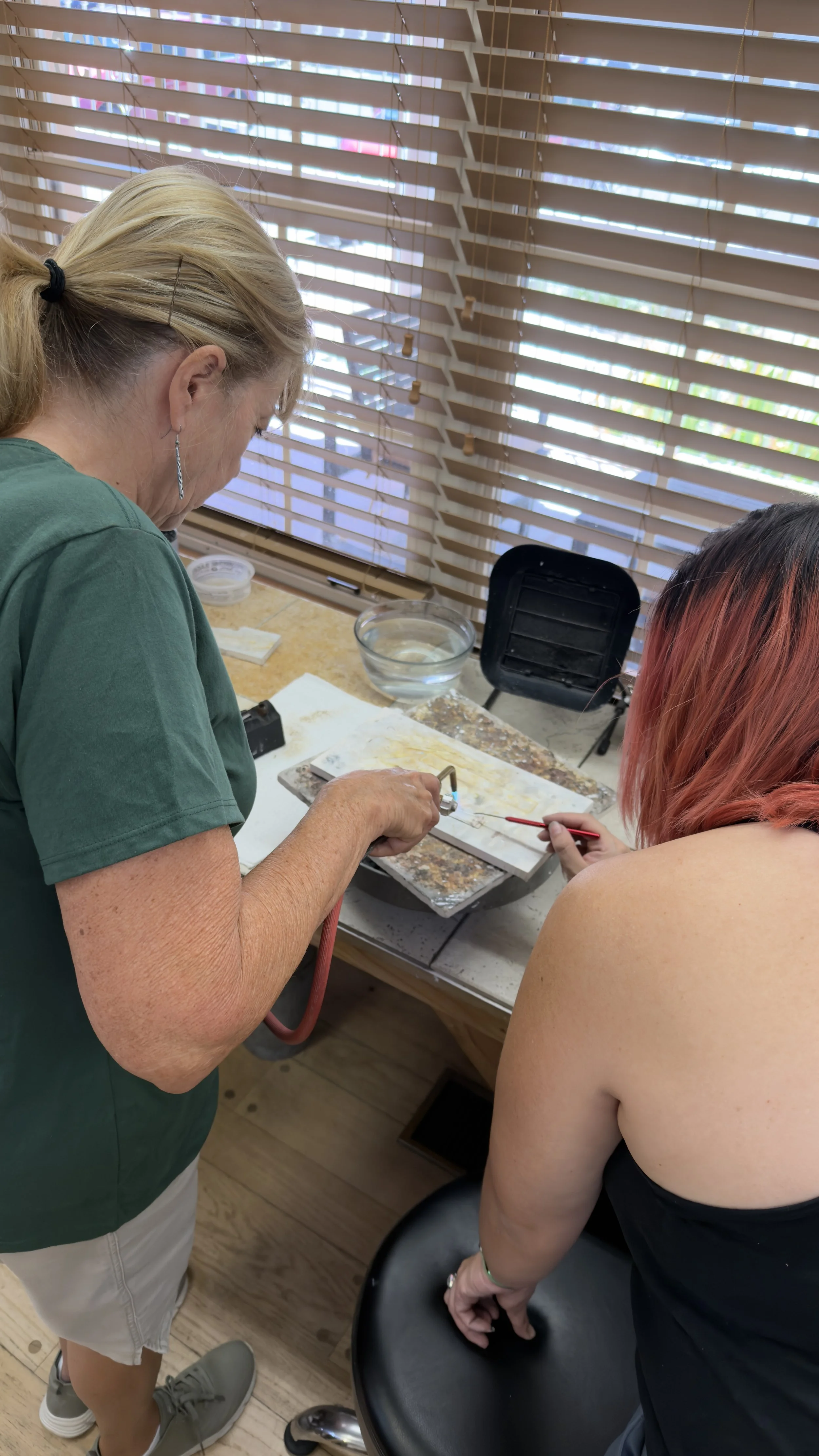 Students shaping metal in a Jewelry Making Class in Albuquerque
