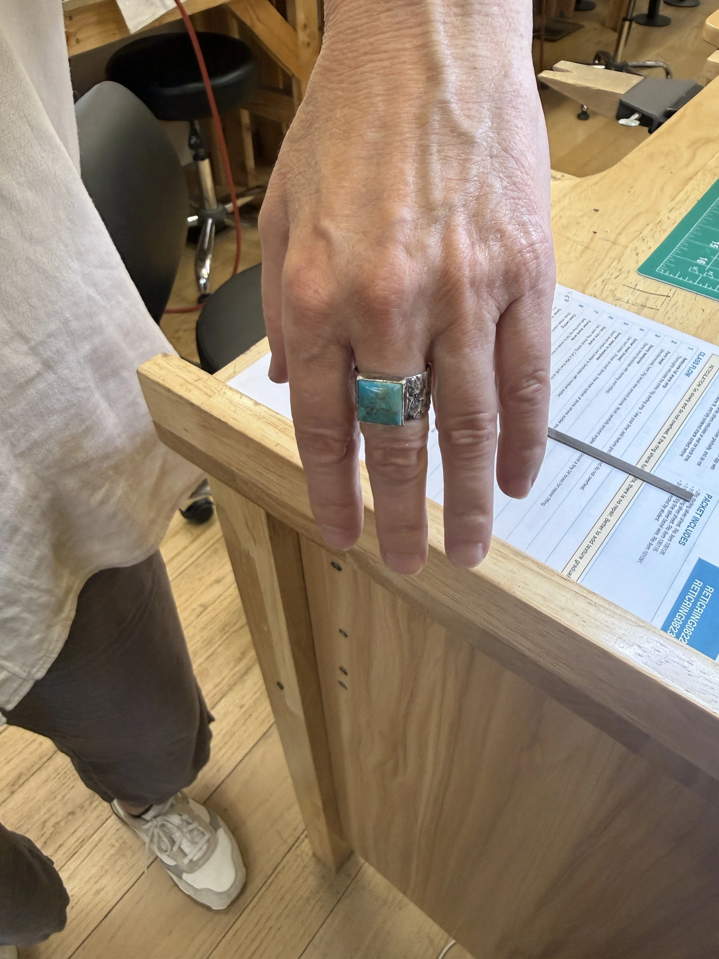 Turquoise ring class Albuquerque featuring a student wearing a finished handmade turquoise ring.
