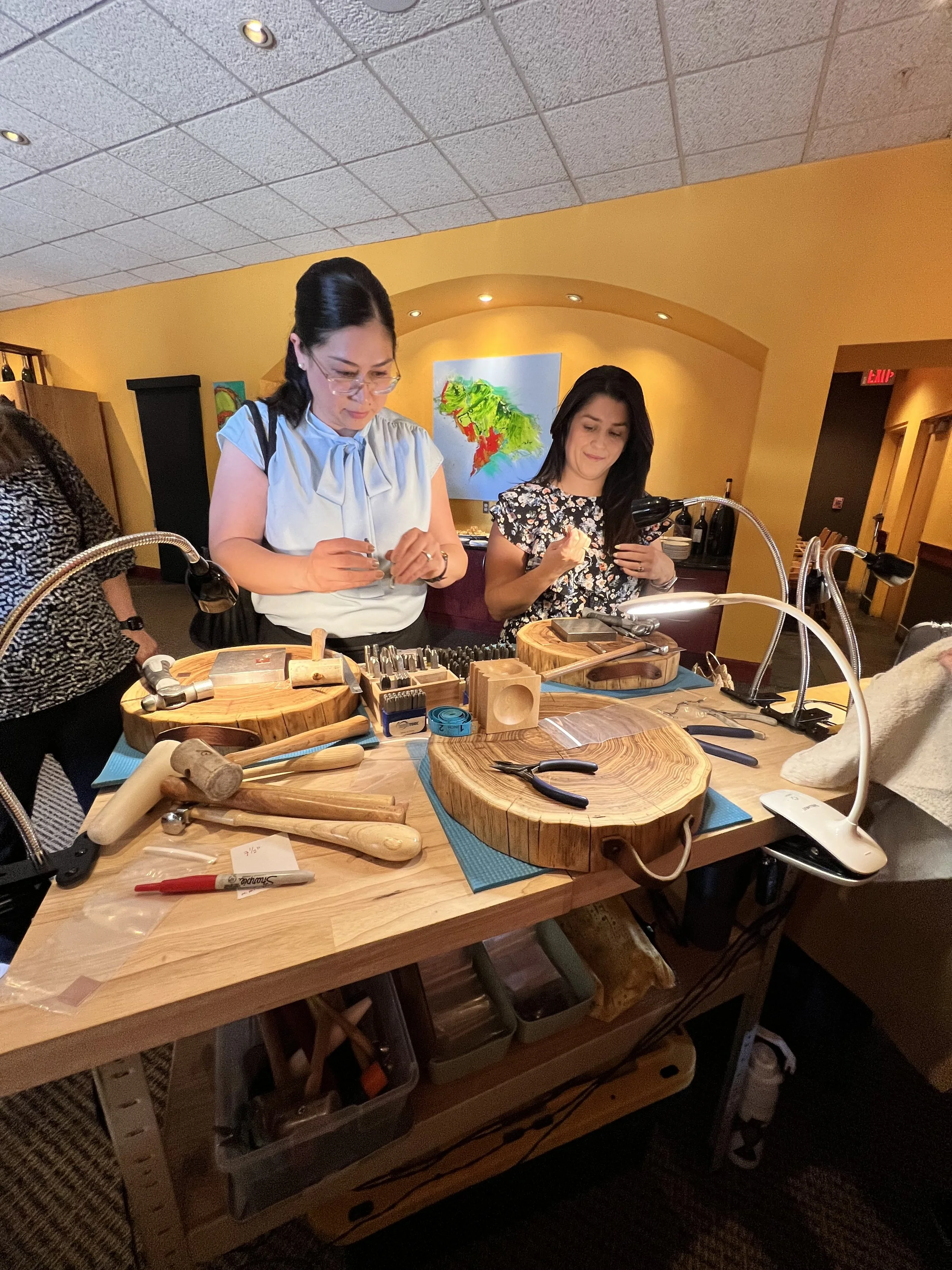 Jewelry workshop in Albuquerque with participants crafting.
