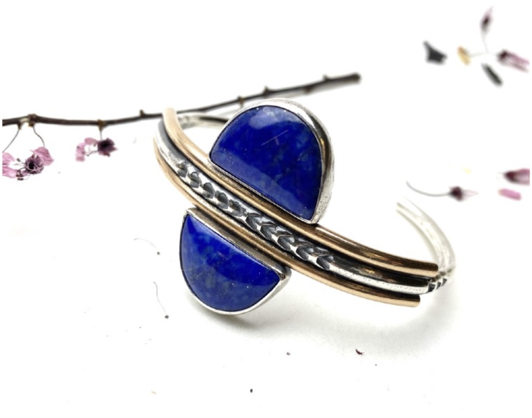 Handmade sterling silver jewelry featuring a blue lapis lazuli stone