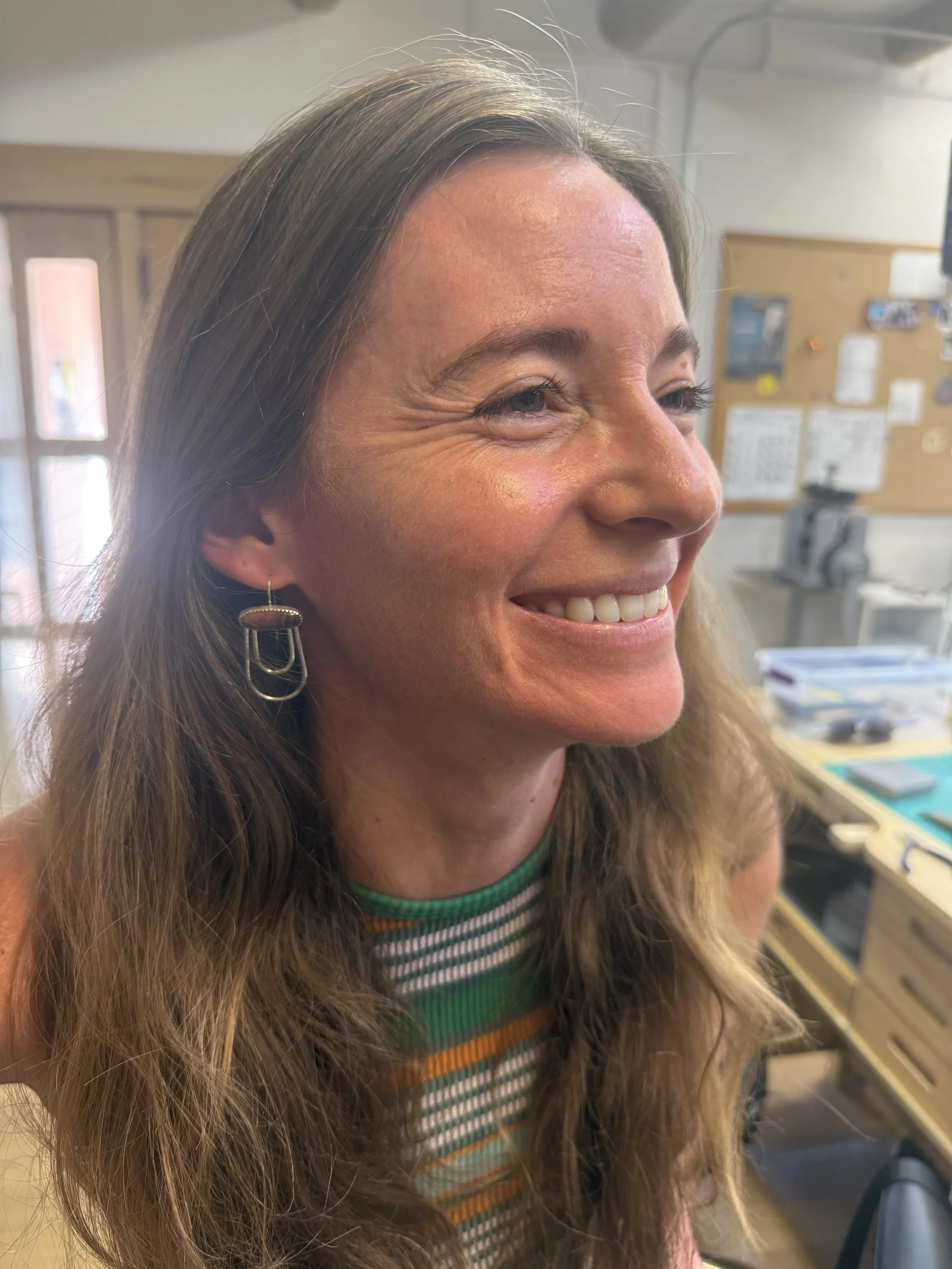 Student wearing finished Jasper Canyon earrings