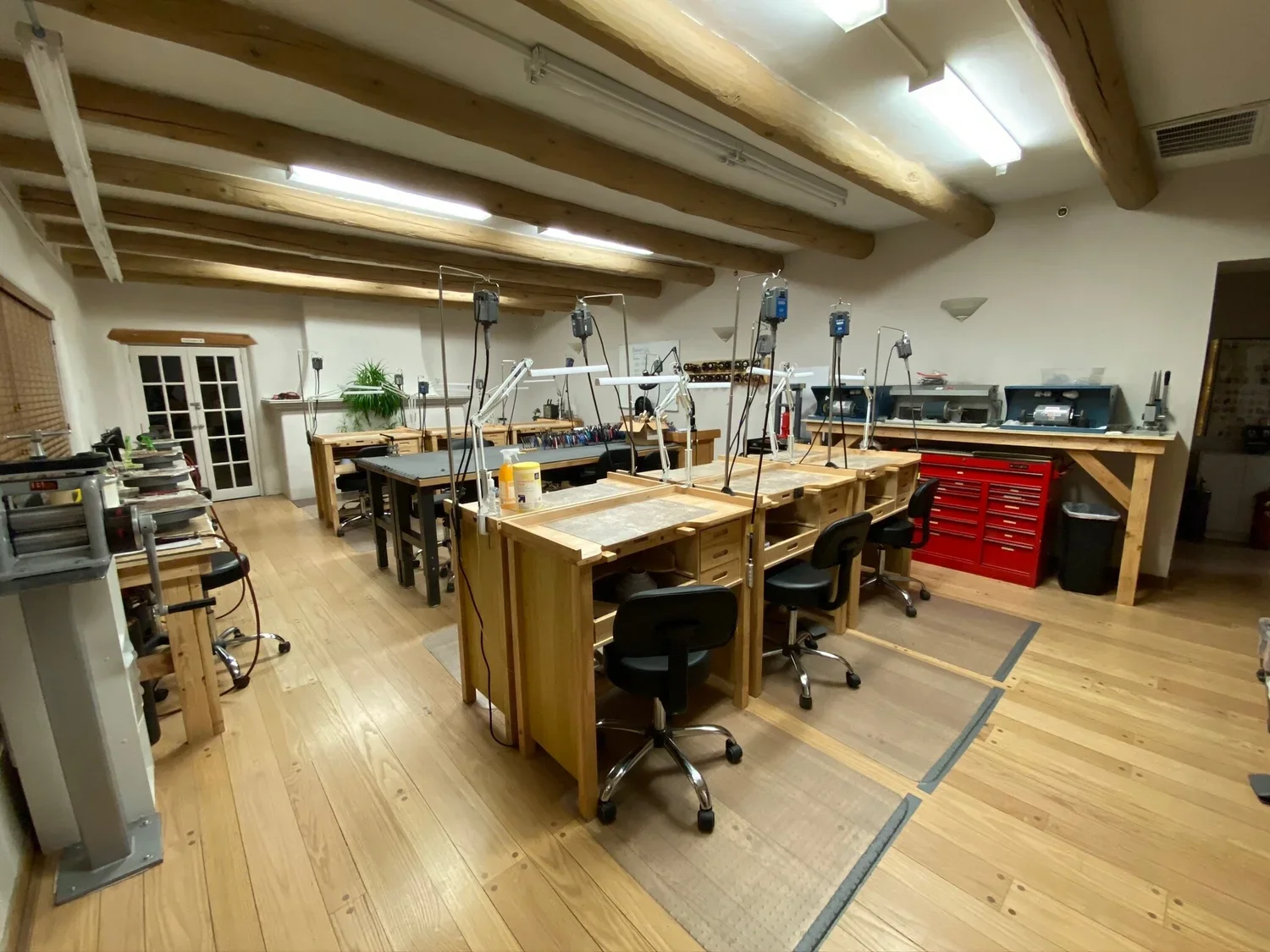 Clean jewelry-making workbenches inside Meltdown Studio in Albuquerque