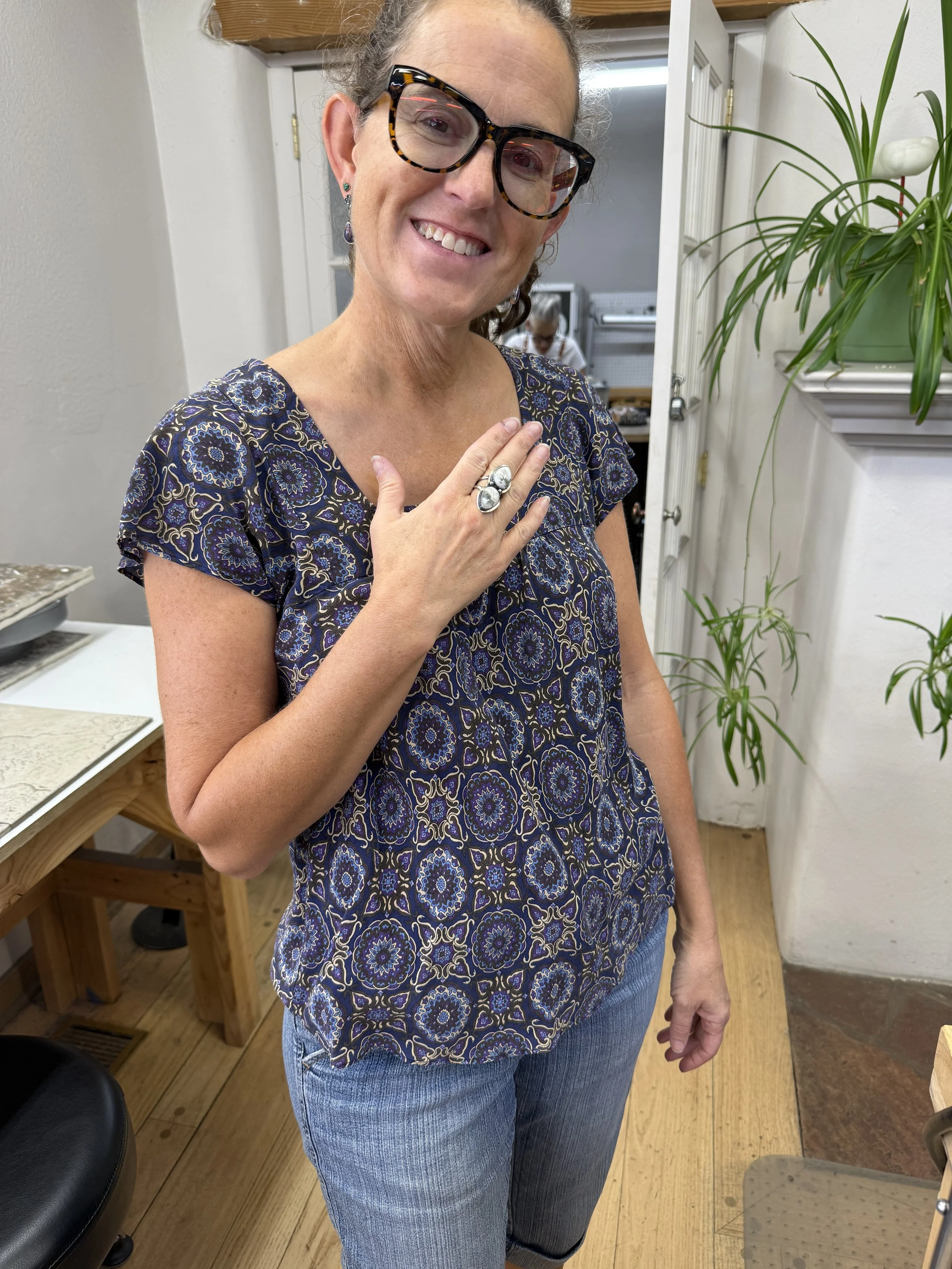 Student showing her finished statement ring