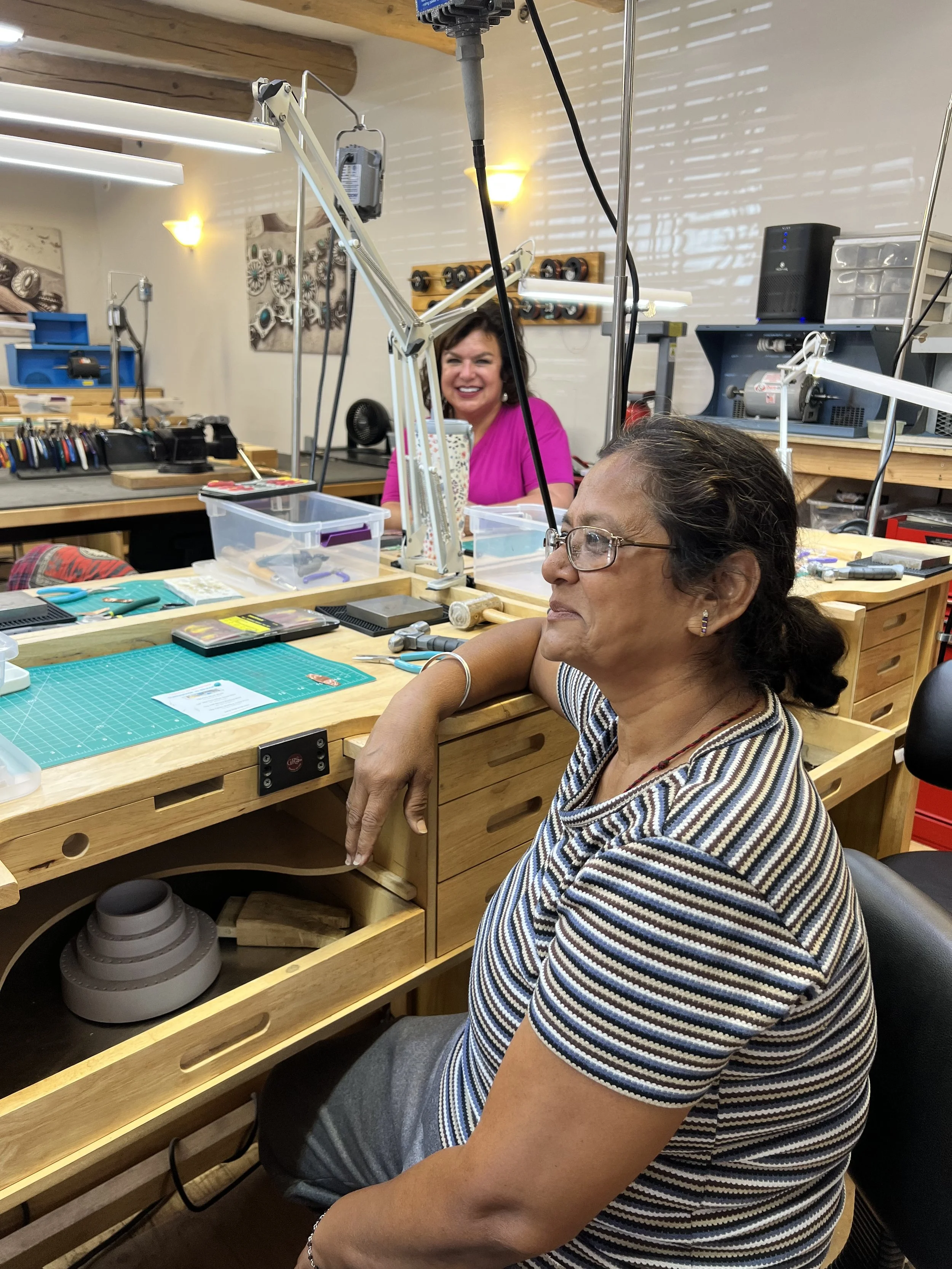 Students preparing to begin a jewelry-making class