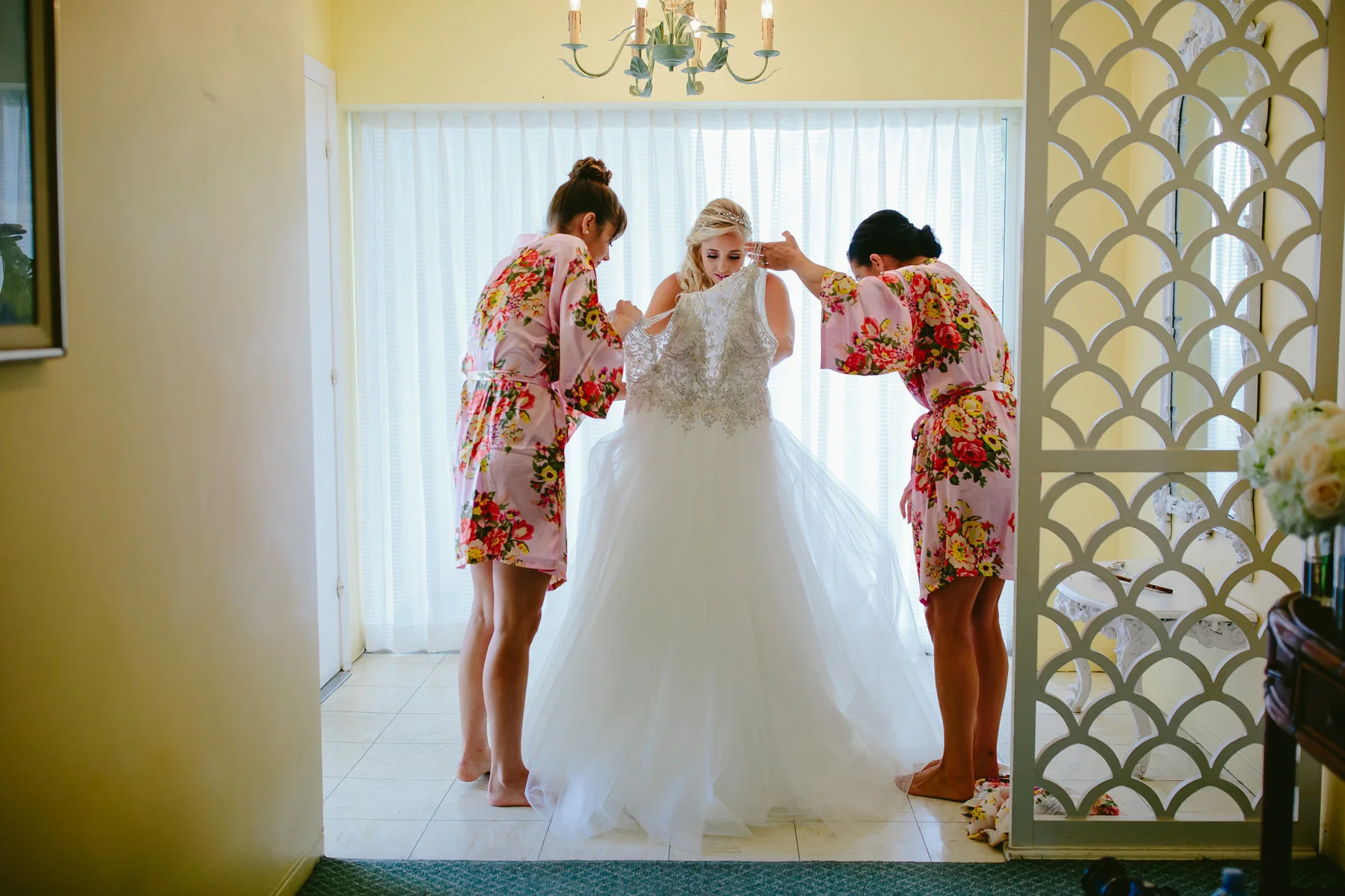 bride-getting-into-dress-tiny-house-photo-hillsboro-beach-club.jpg