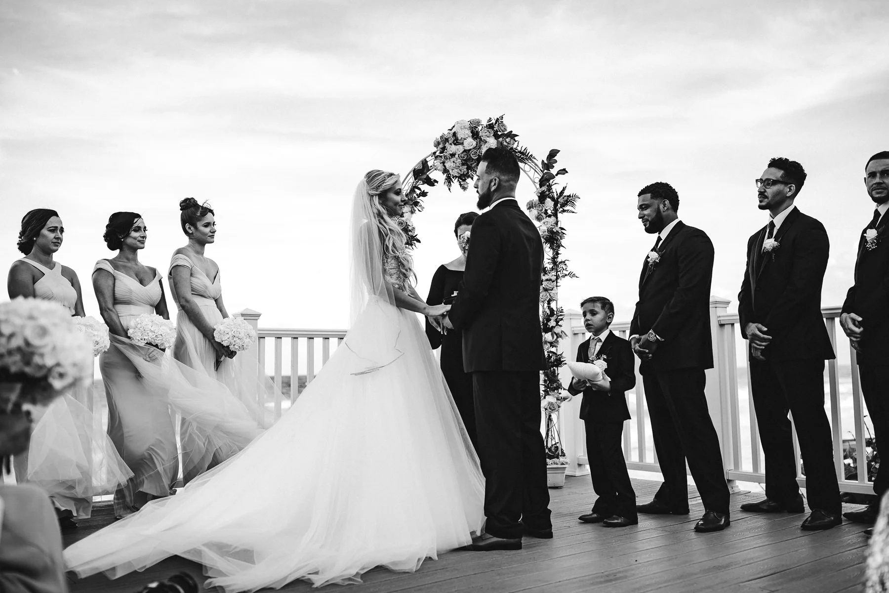 black-and-white-beach-wedding-ceremony-tiny-house-photo.jpg