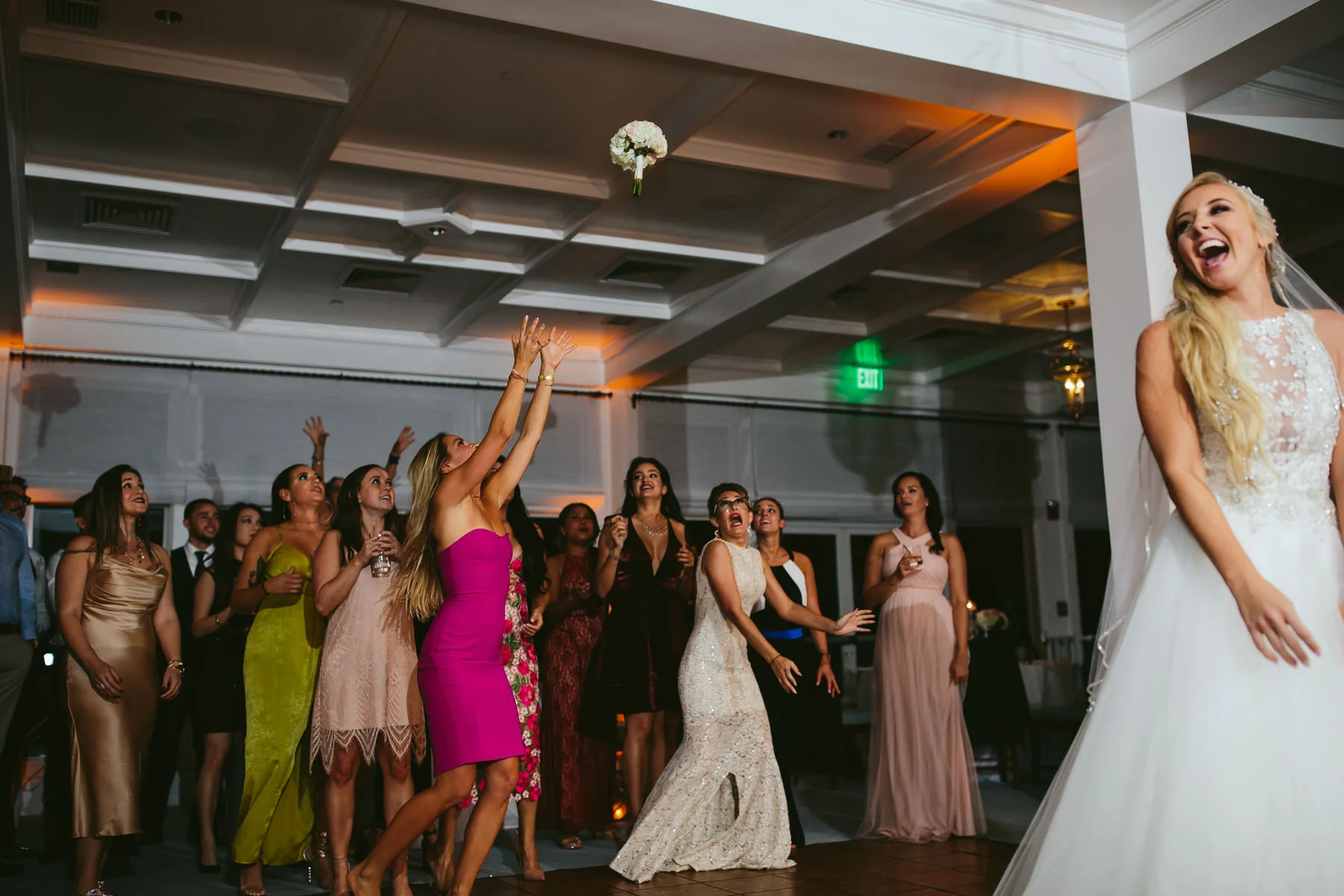 epic-bouquet-toss-moments-tiny-house-photo.jpg