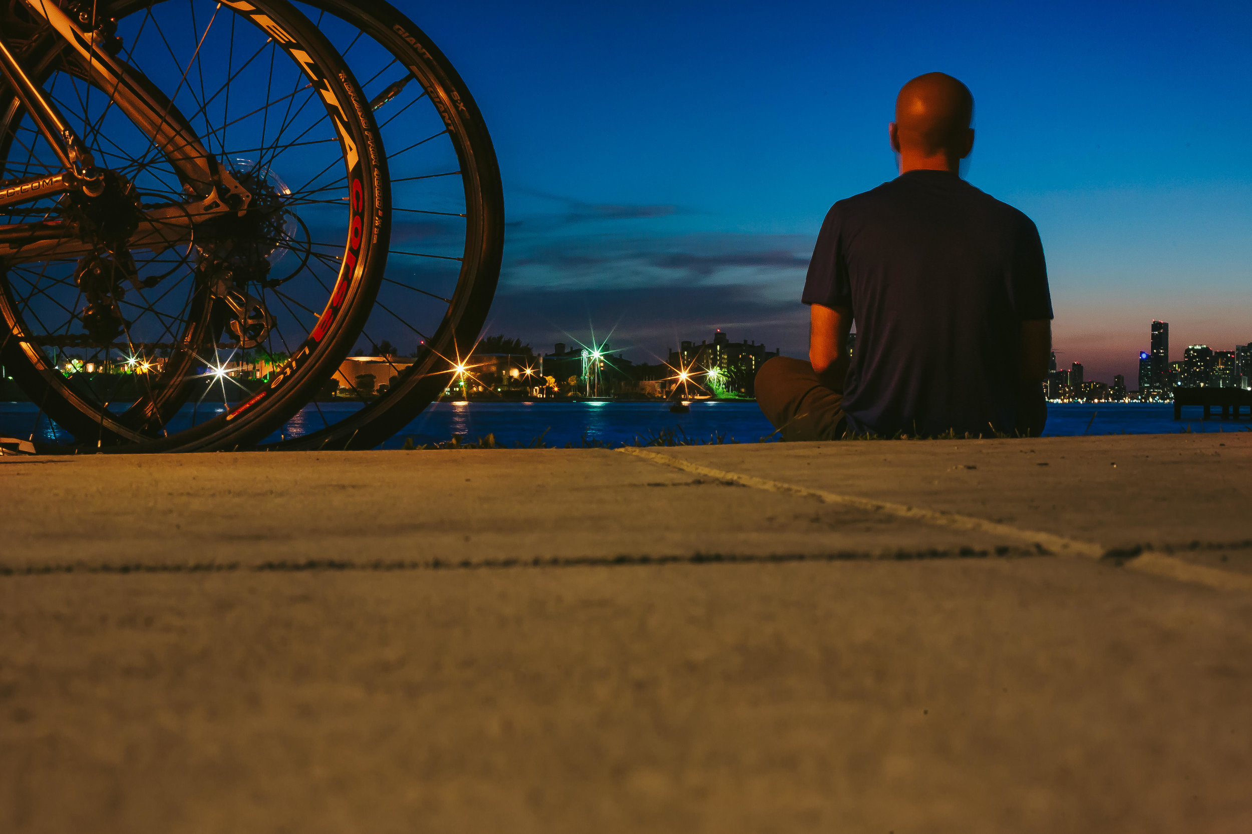 Adam critical mass miami sitting night portrait