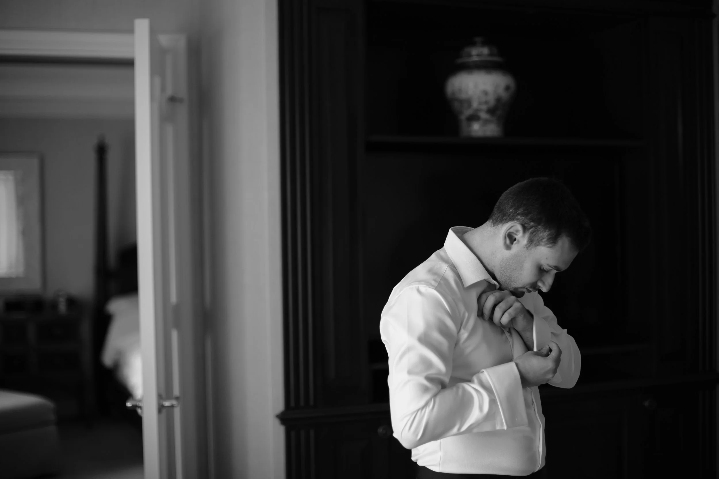 groom_getting_ready_tiny_house_photo_coral_gables_weddings.jpg
