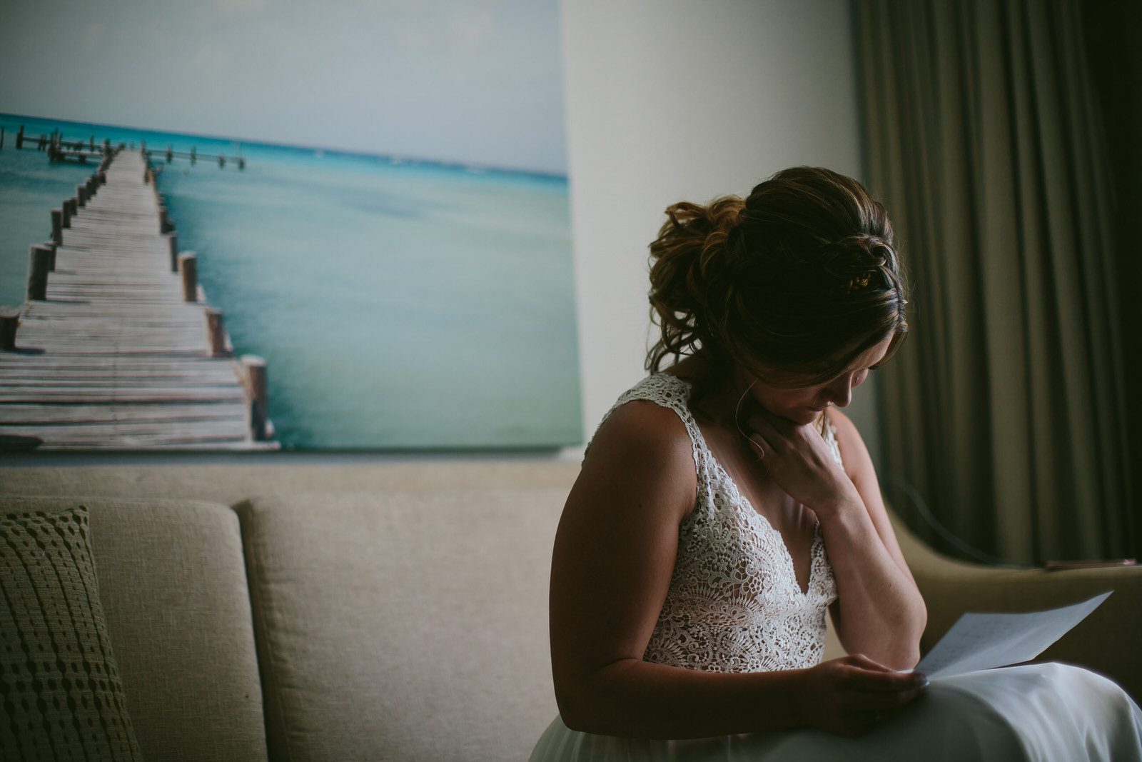 bride_reading_note_lgbtq_wedding_amara_cay_resort.jpg