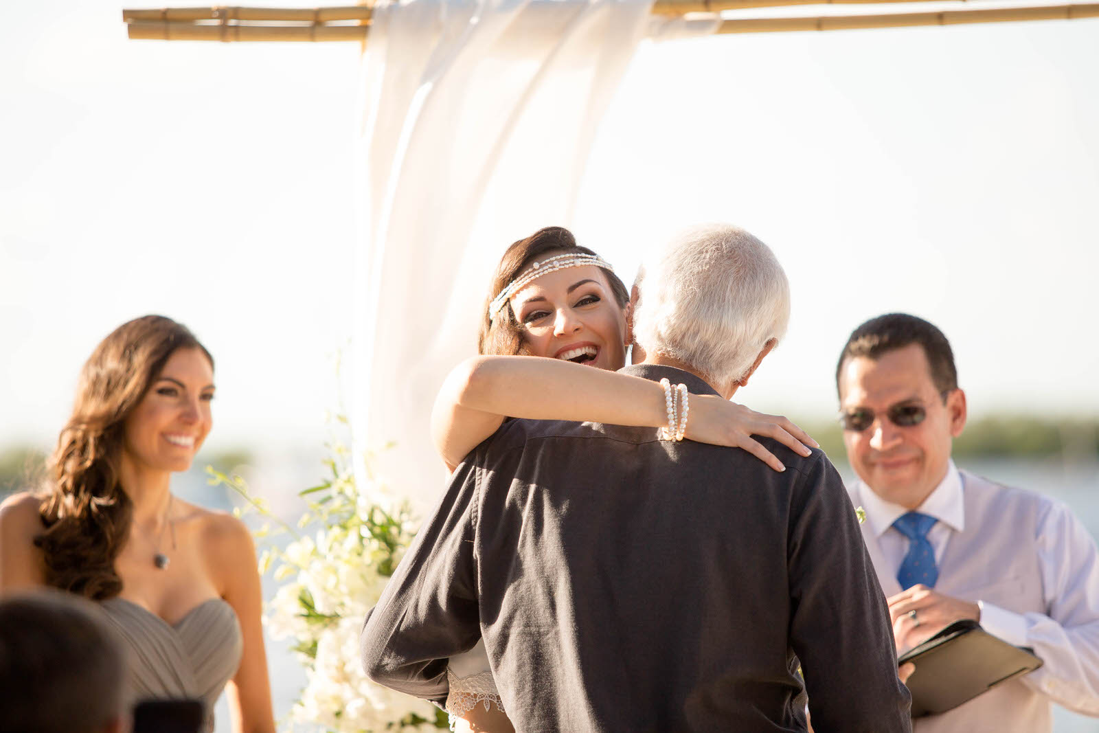 bride_hugging_dad_destination_wedding.jpg