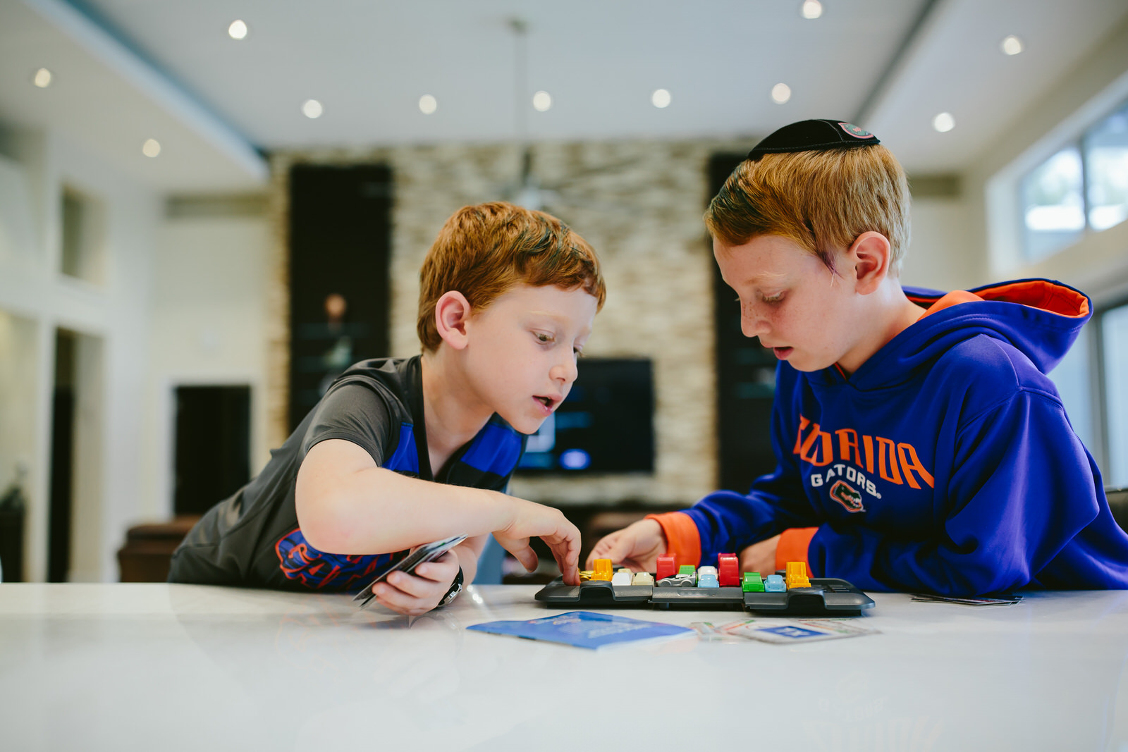 kids_playing_games_authentic_family_photographer_denver.jpg