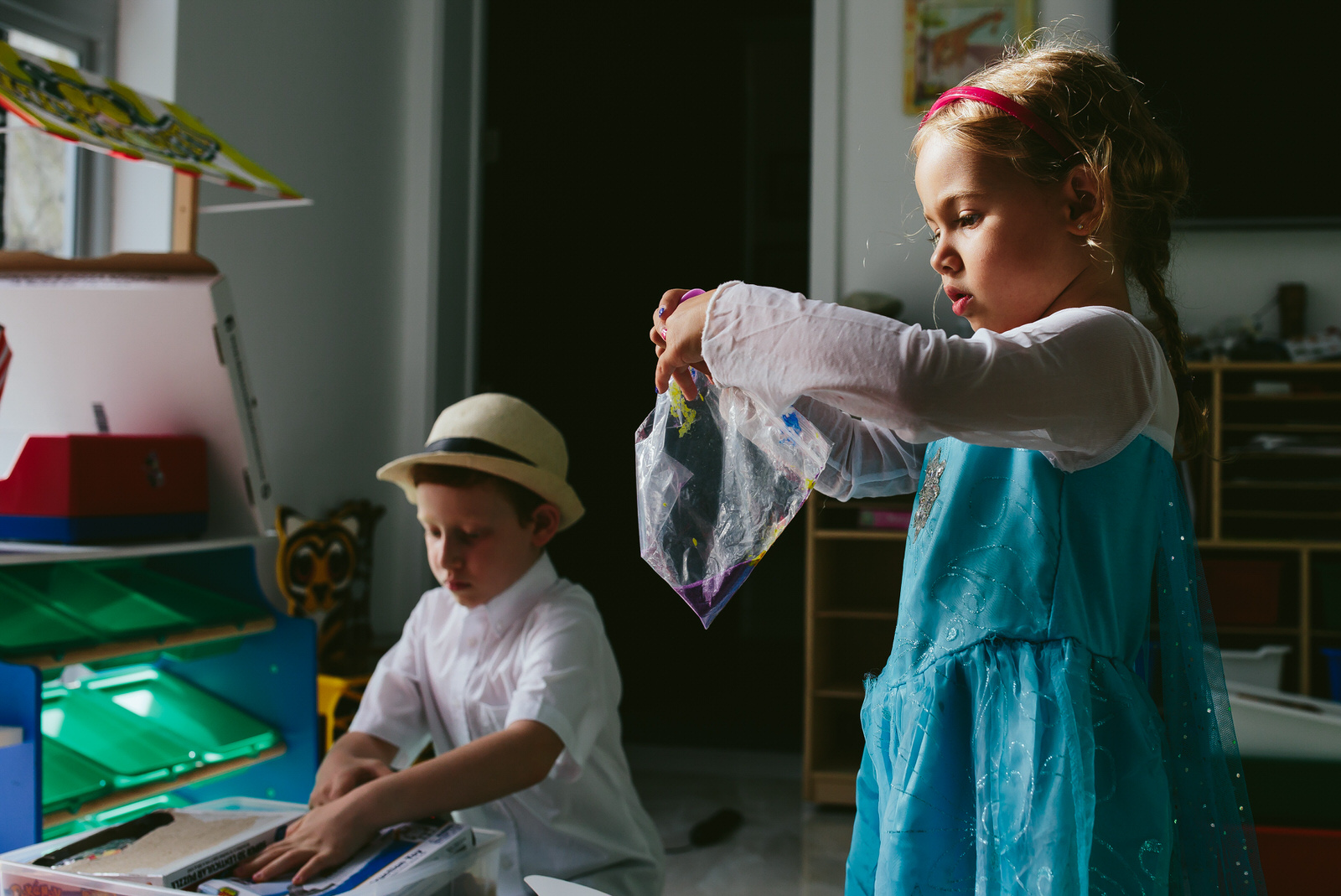 siblings_playing_authentic_family_photos_tiny_house_photo.jpg